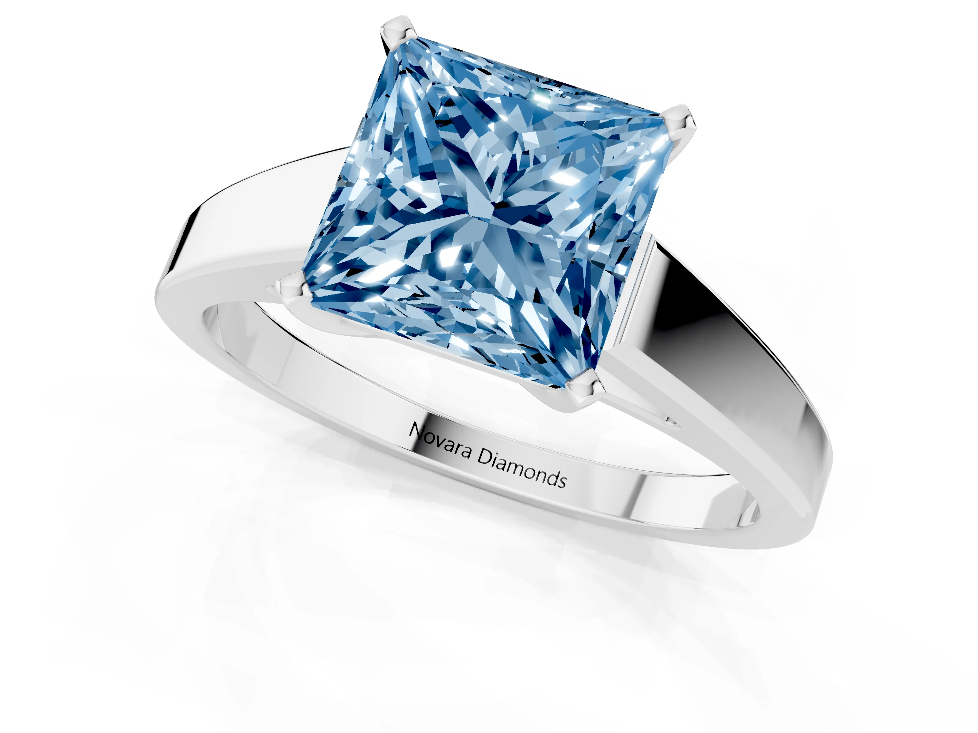 Fancy Blue Princess Cut Diamond Solitaire Engagement Ring Set in White gold with Prong Setting and Tapered Band