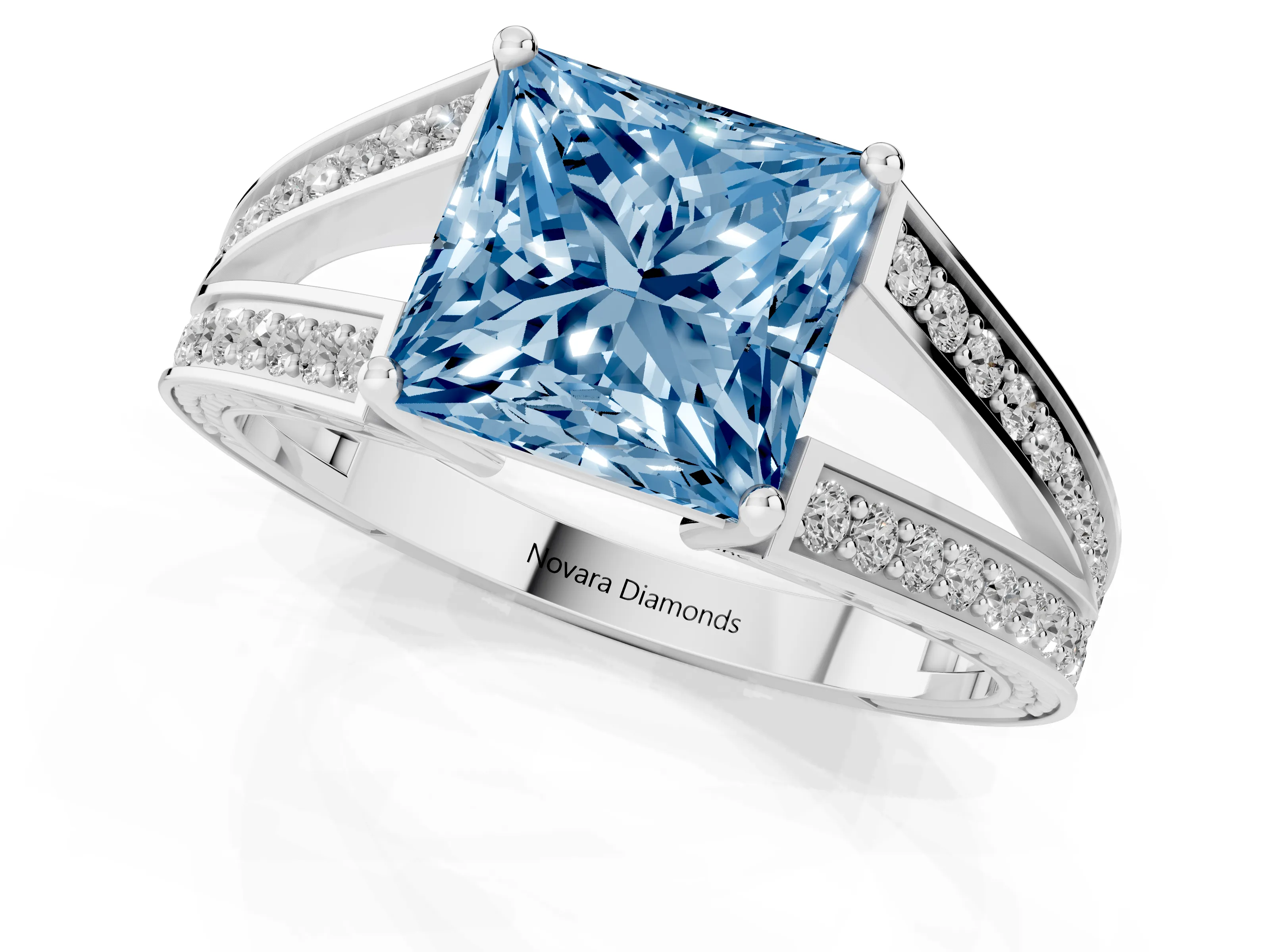 Fancy Blue Princess Cut Diamond Split Shank Ring Set in White gold with Pavé Band and Prong Setting