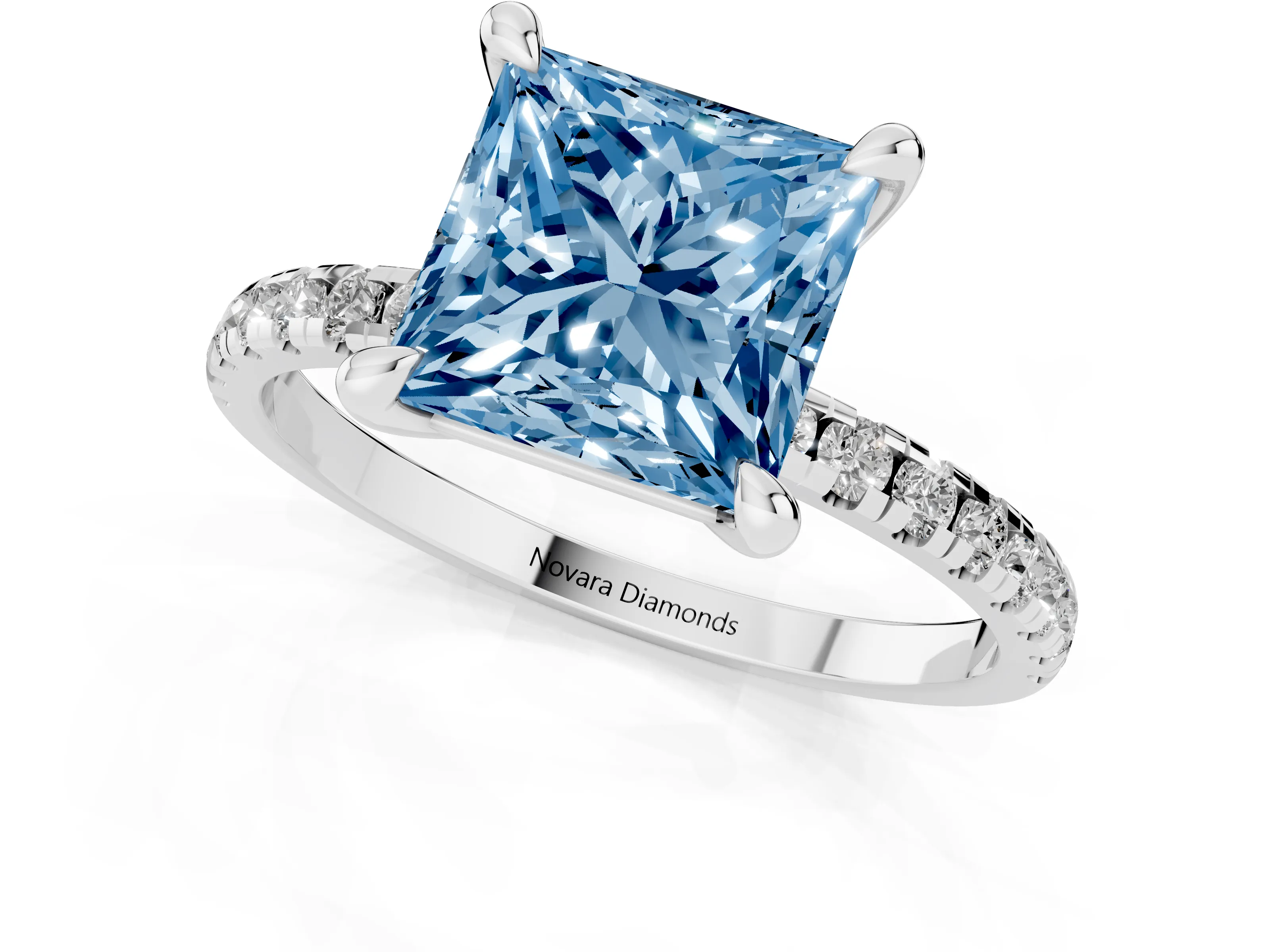 Fancy Blue Princess Cut Diamond Brilliant Solitaire Ring Set in White gold with Pavé Band and Prong Setting