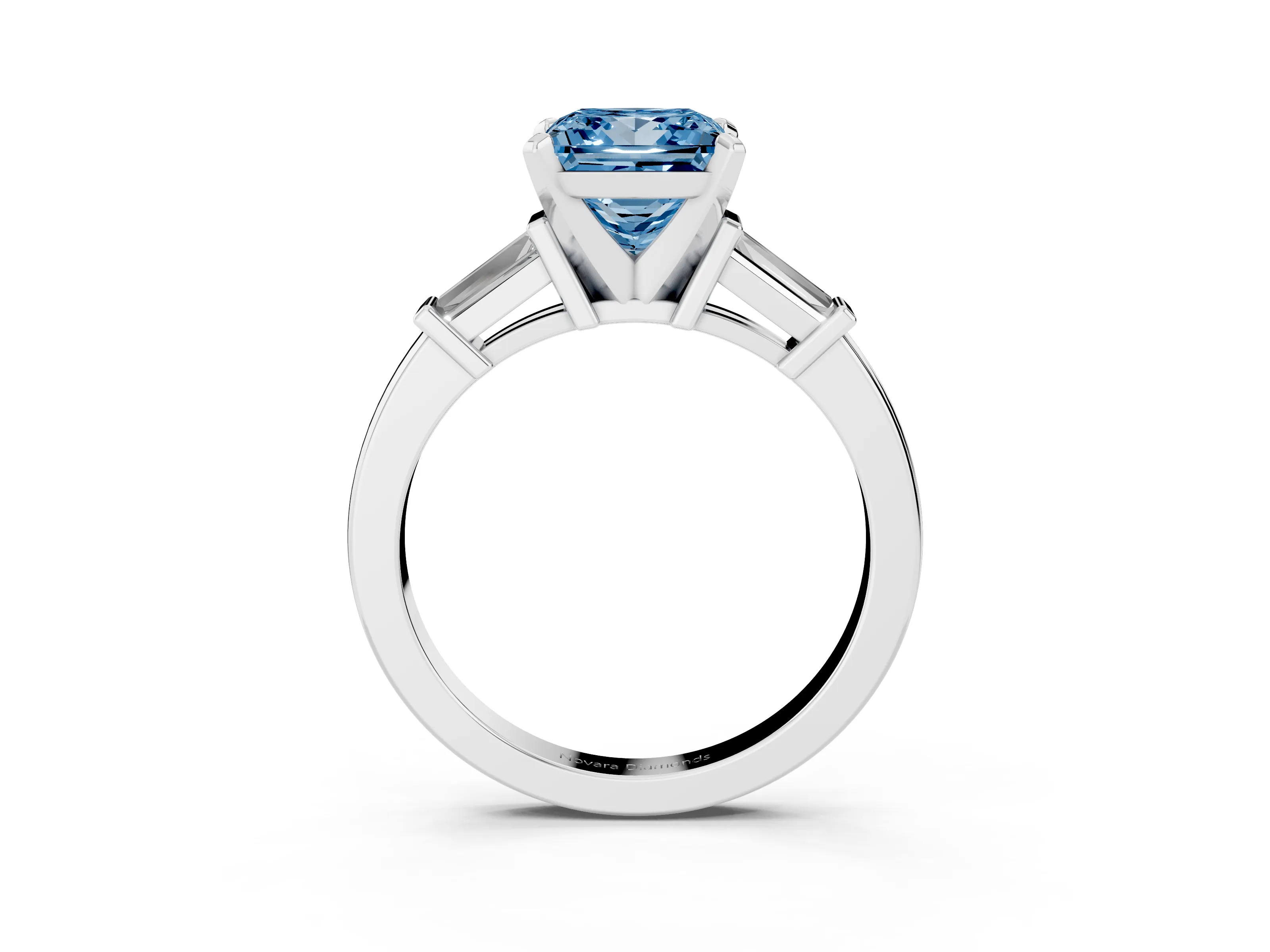Fancy Blue Princess Cut Diamond Solitaire Ring Set in White gold with Tapered Baguette Accents and Prong Setting