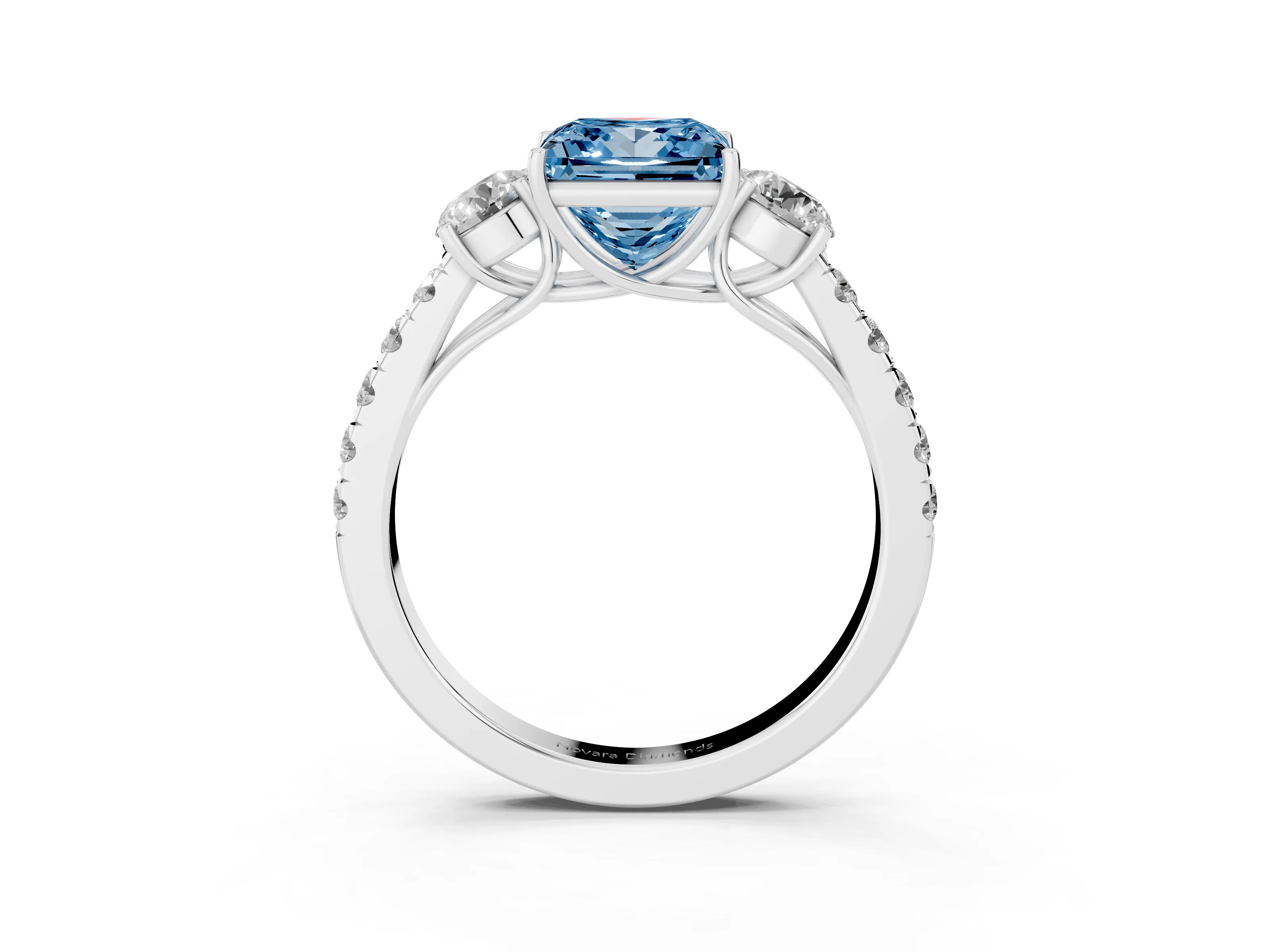 Fancy Blue Princess Cut Diamond Three-Stone Ring Set in Platinum with Round Side Stones and Delicate Pavé Band
