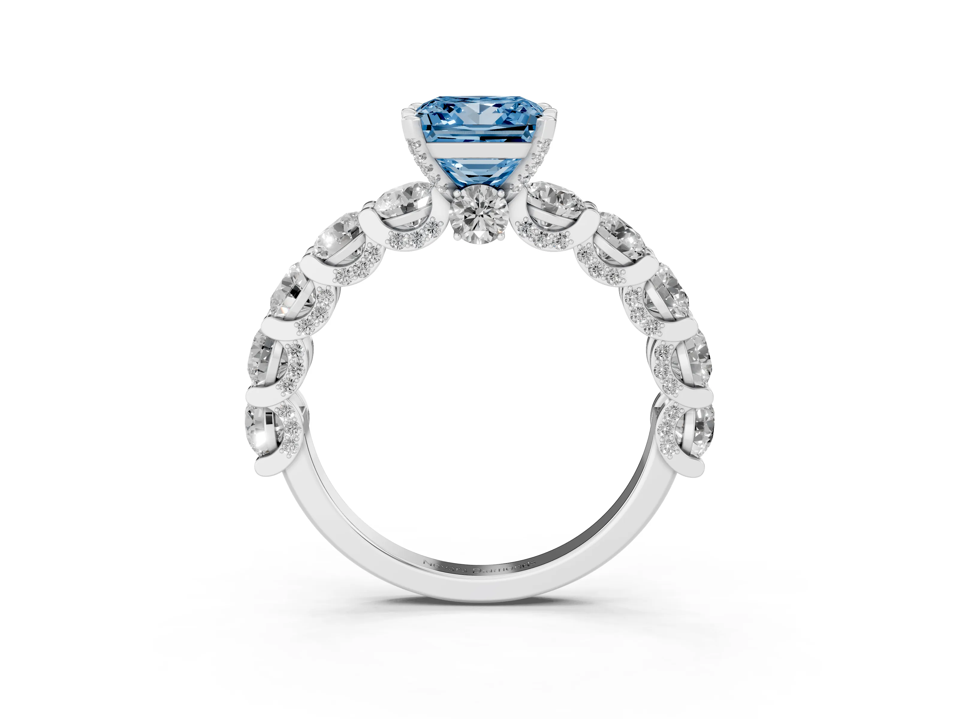 Fancy Blue Princess Cut Diamond Side Stone Ring Set in Platinum with Alternating Round and Oval Side Stones