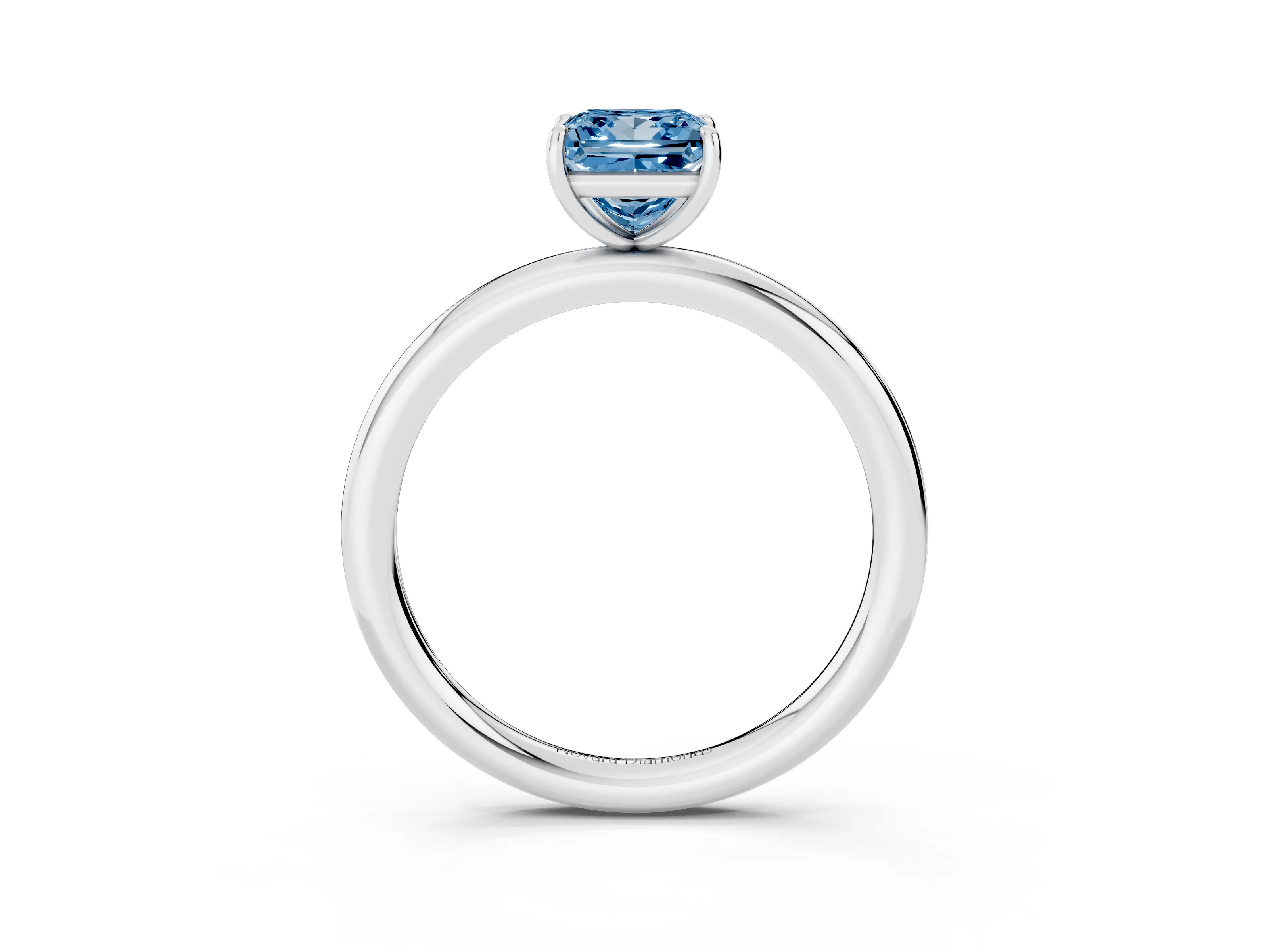 Fancy Blue Princess Cut Diamond Solitaire Ring Set in Silver with Prong Setting on a Polished Plain Band