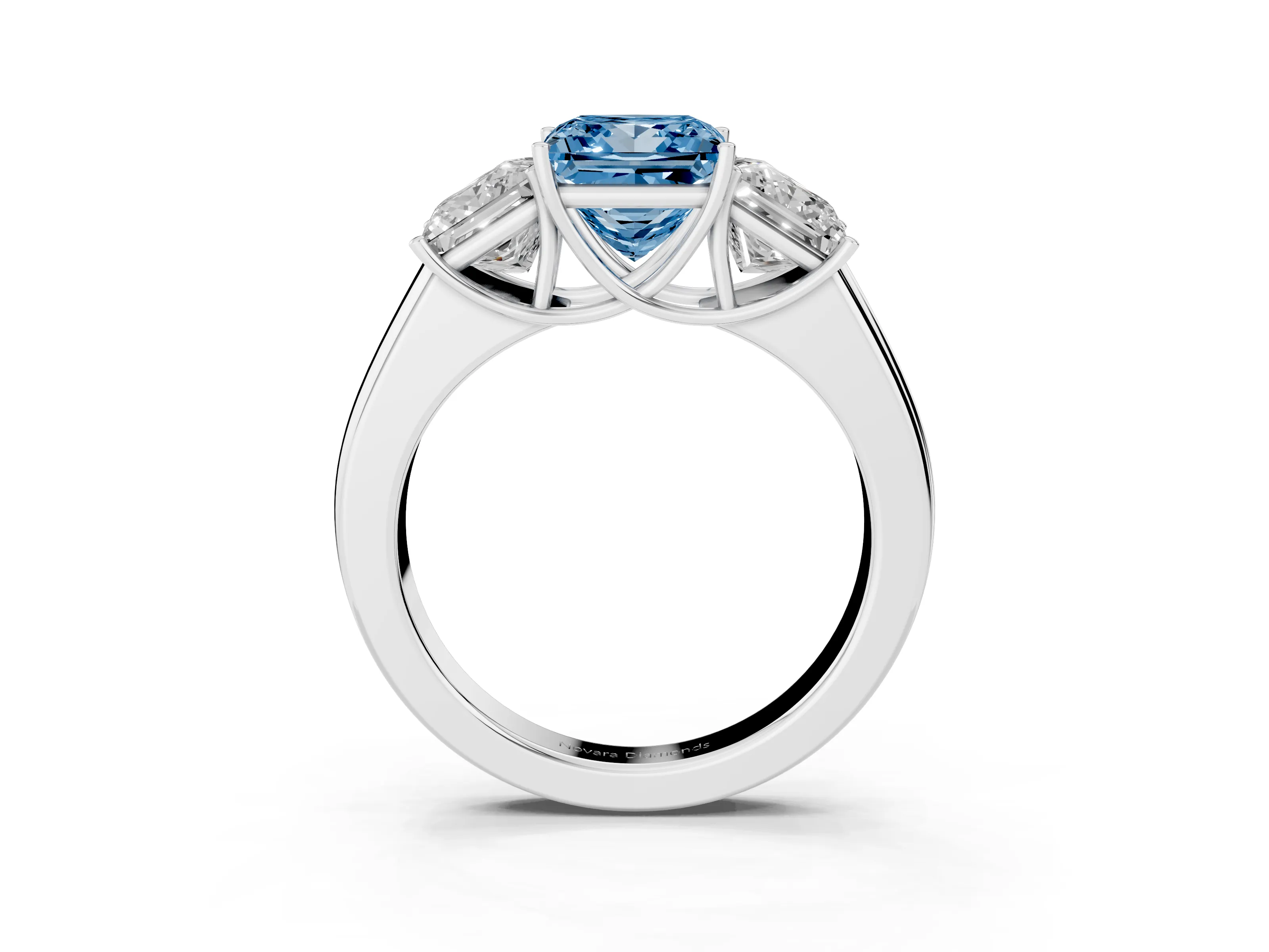 Fancy Blue Three-Stone Princess Cut Diamond Ring Set in Platinum with Matching Prong Settings and Plain Band