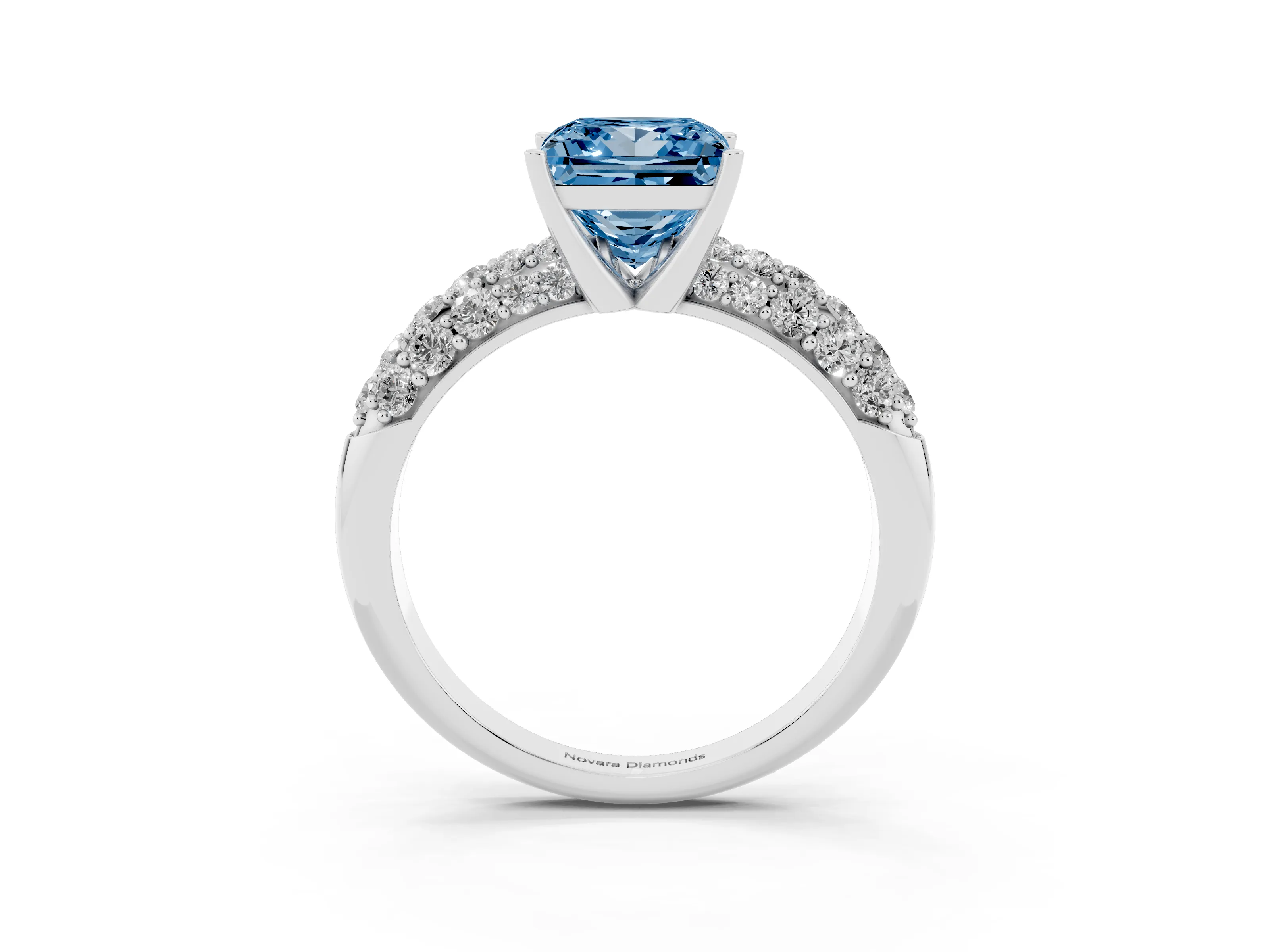 Fancy Blue Princess Cut Diamond Pavé Band Solitaire Ring Set in White gold with Close-Set Accent Stones and Prong Setting