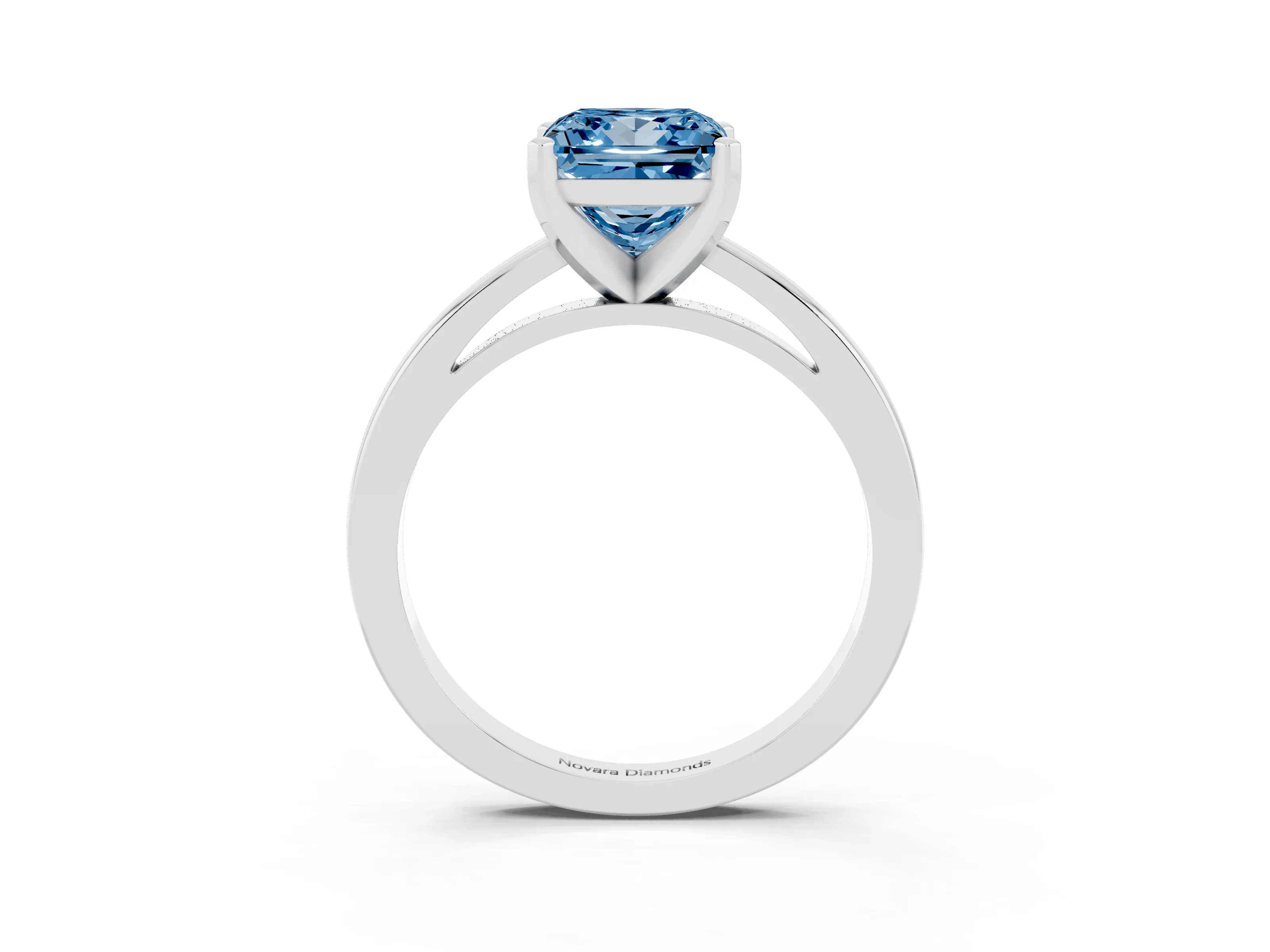 Fancy Blue Princess Cut Diamond Solitaire Engagement Ring Set in White gold with Prong Setting on a Classic Band