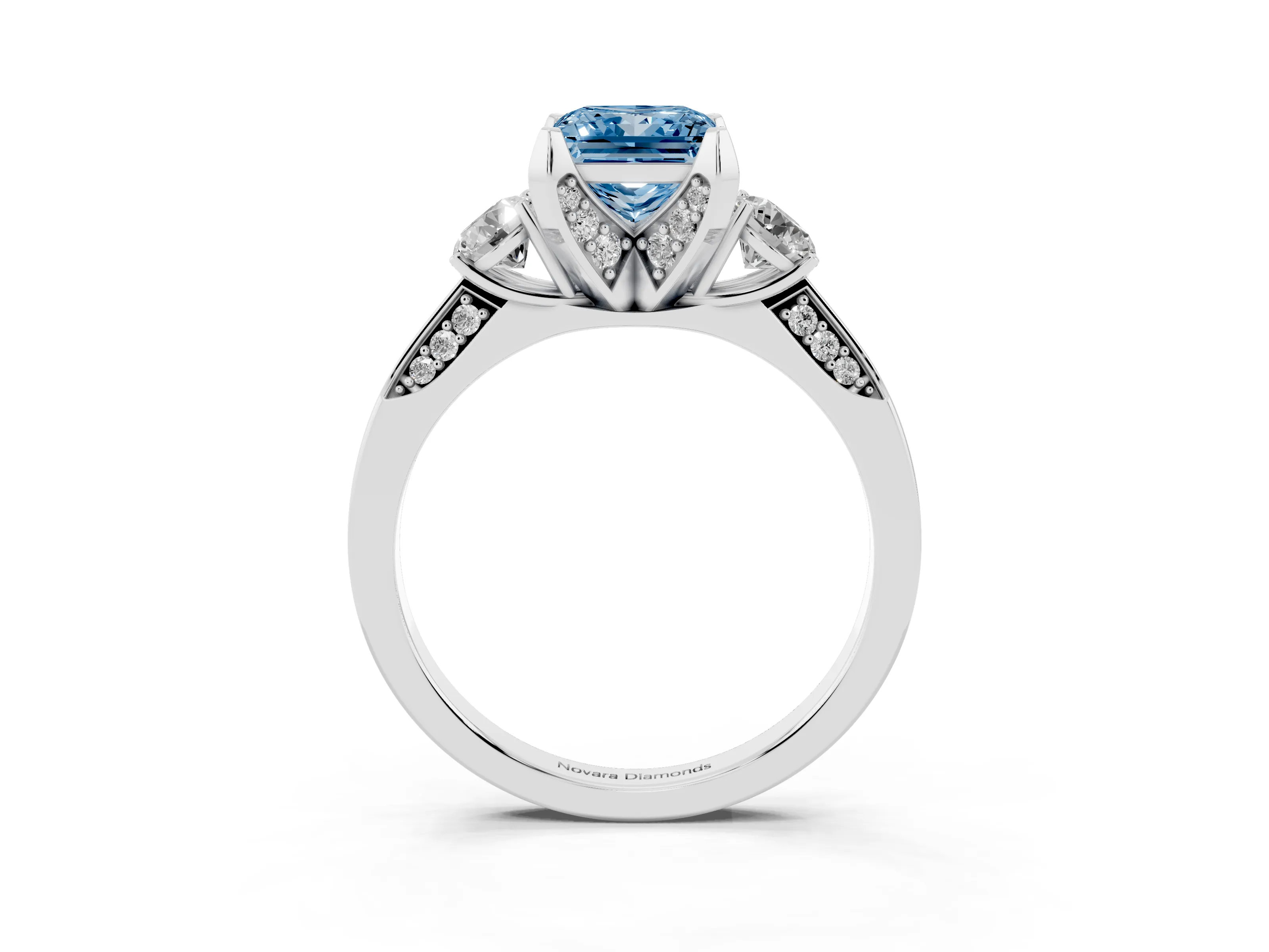 Fancy Blue Princess Cut Diamond Three-Stone Ring Set in White gold with Pavé Band and Smaller Side Stones
