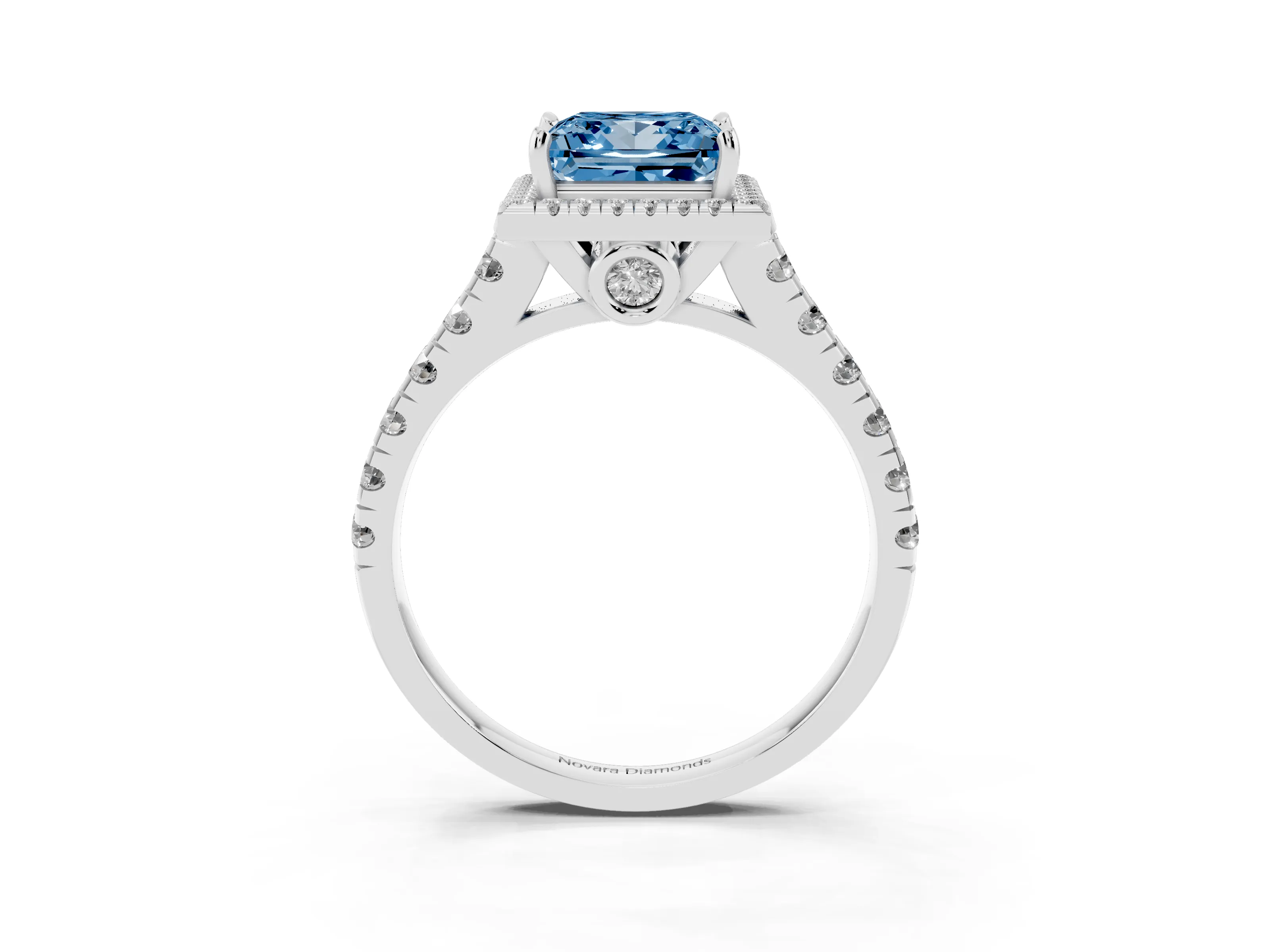 Fancy Blue Princess Cut Diamond Halo Engagement Ring Set in White gold with Pavé Band and Prong-Set Center