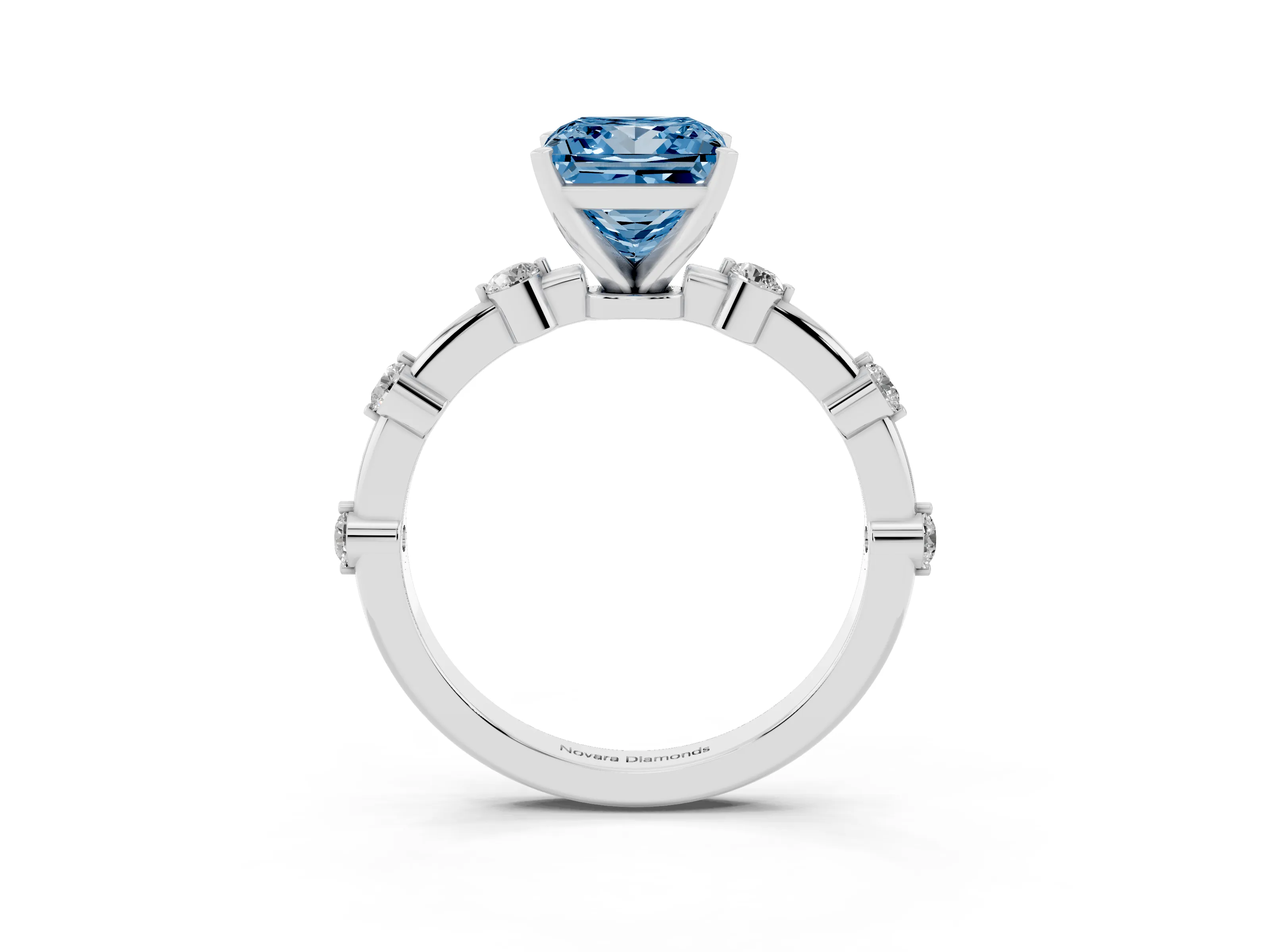 Fancy Blue Princess Cut Diamond Solitaire Ring Set in Silver with Bezel Set Side Stones and Prong Setting