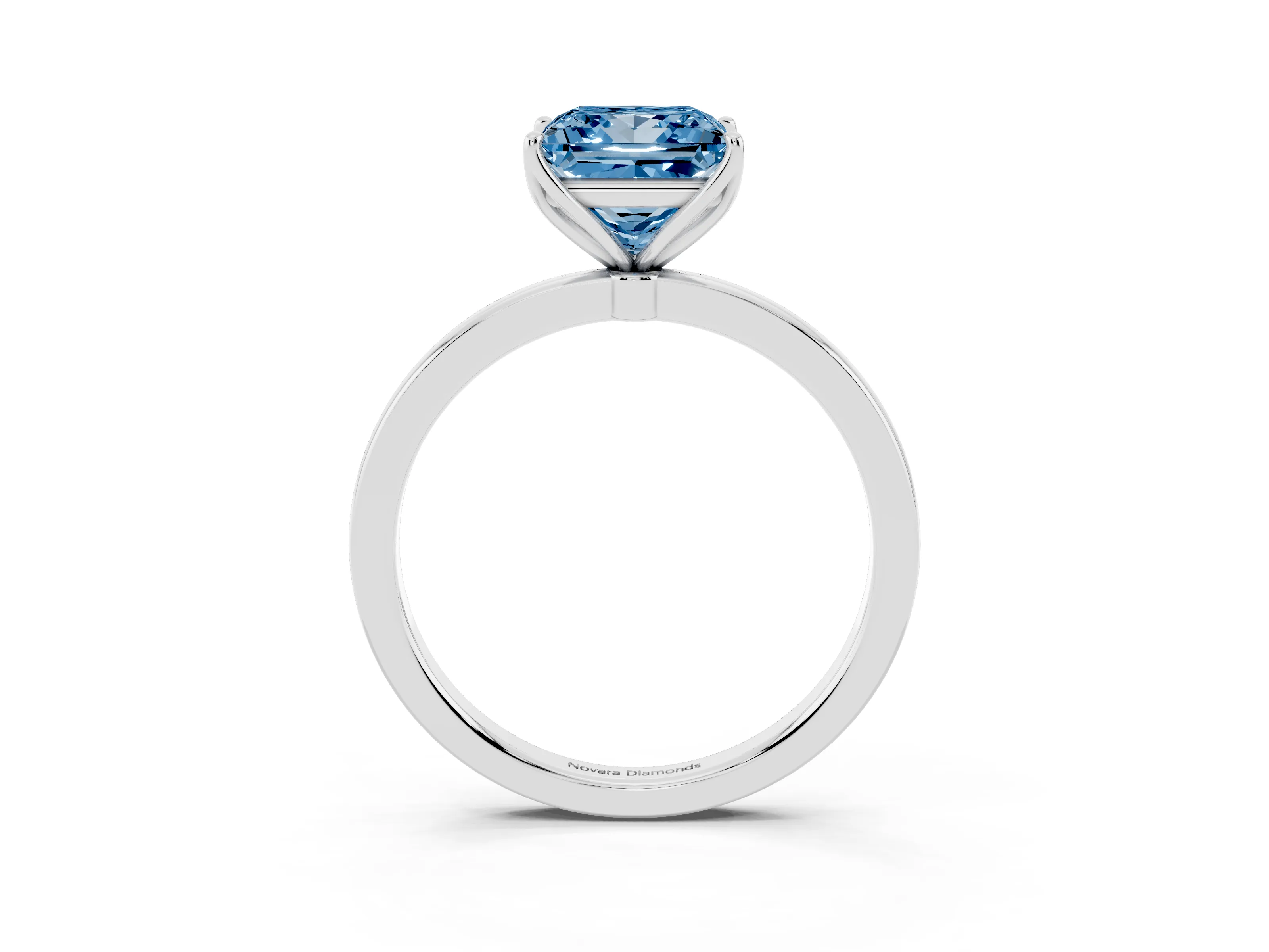 Fancy Blue Princess Cut Diamond Solitaire Ring Set in White gold with Prong Setting and Thin Polished Band