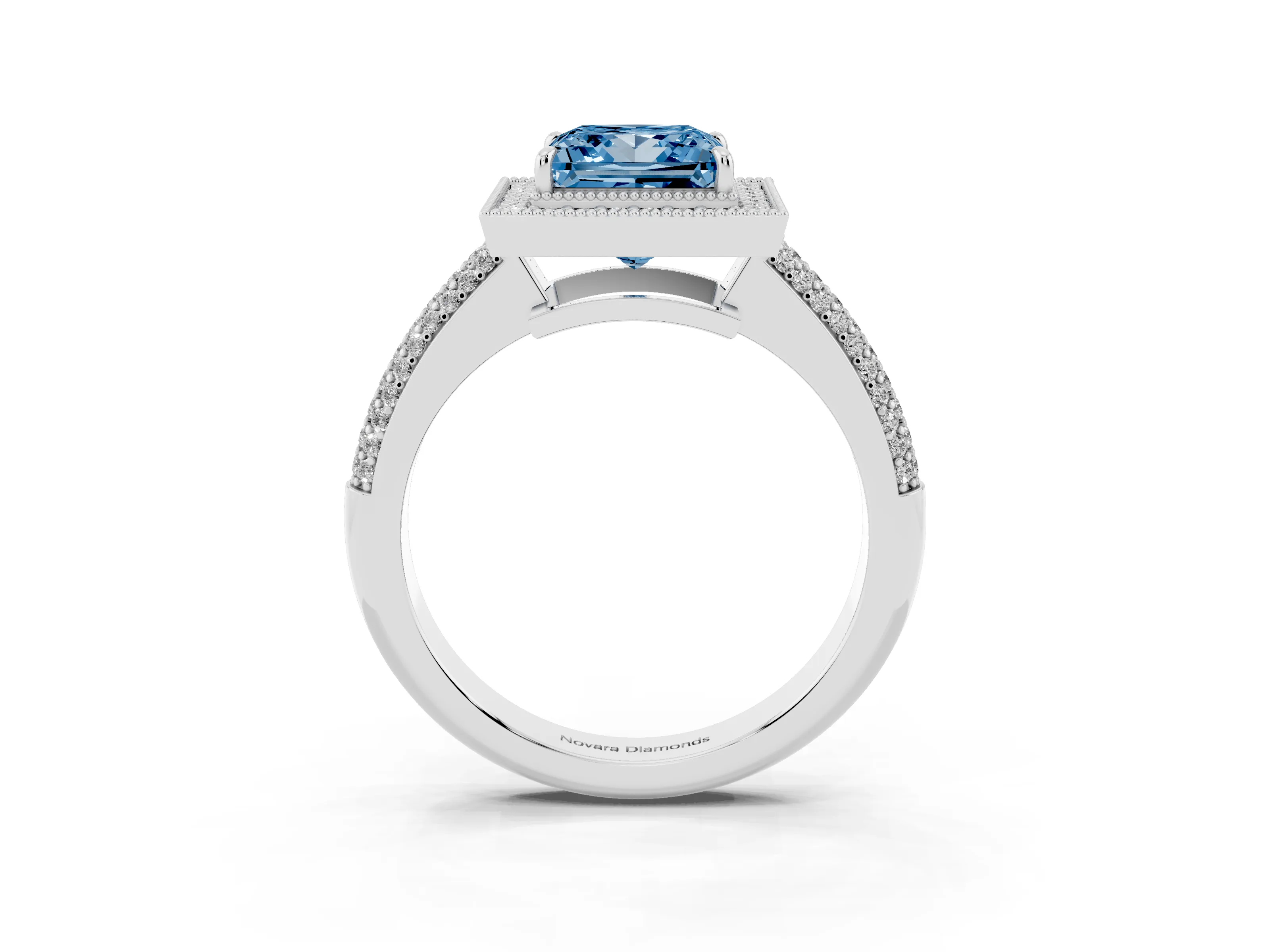 Fancy Blue Princess Cut Diamond Halo Pavé Band Set in White gold with Prong Setting