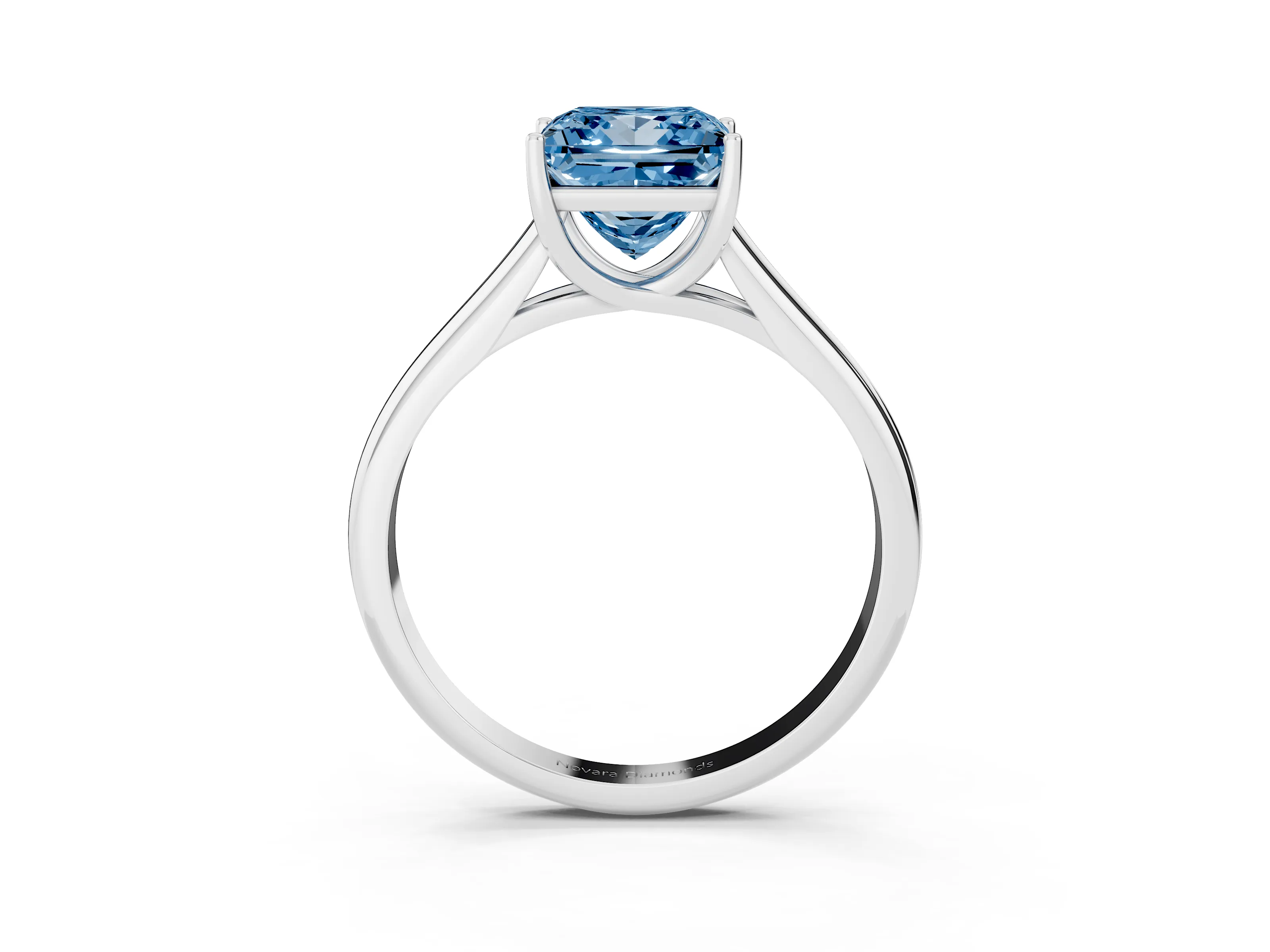 Fancy Blue Princess Cut Diamond Solitaire Engagement Ring Set in White gold with Subtly Tapered Band and Prong Setting
