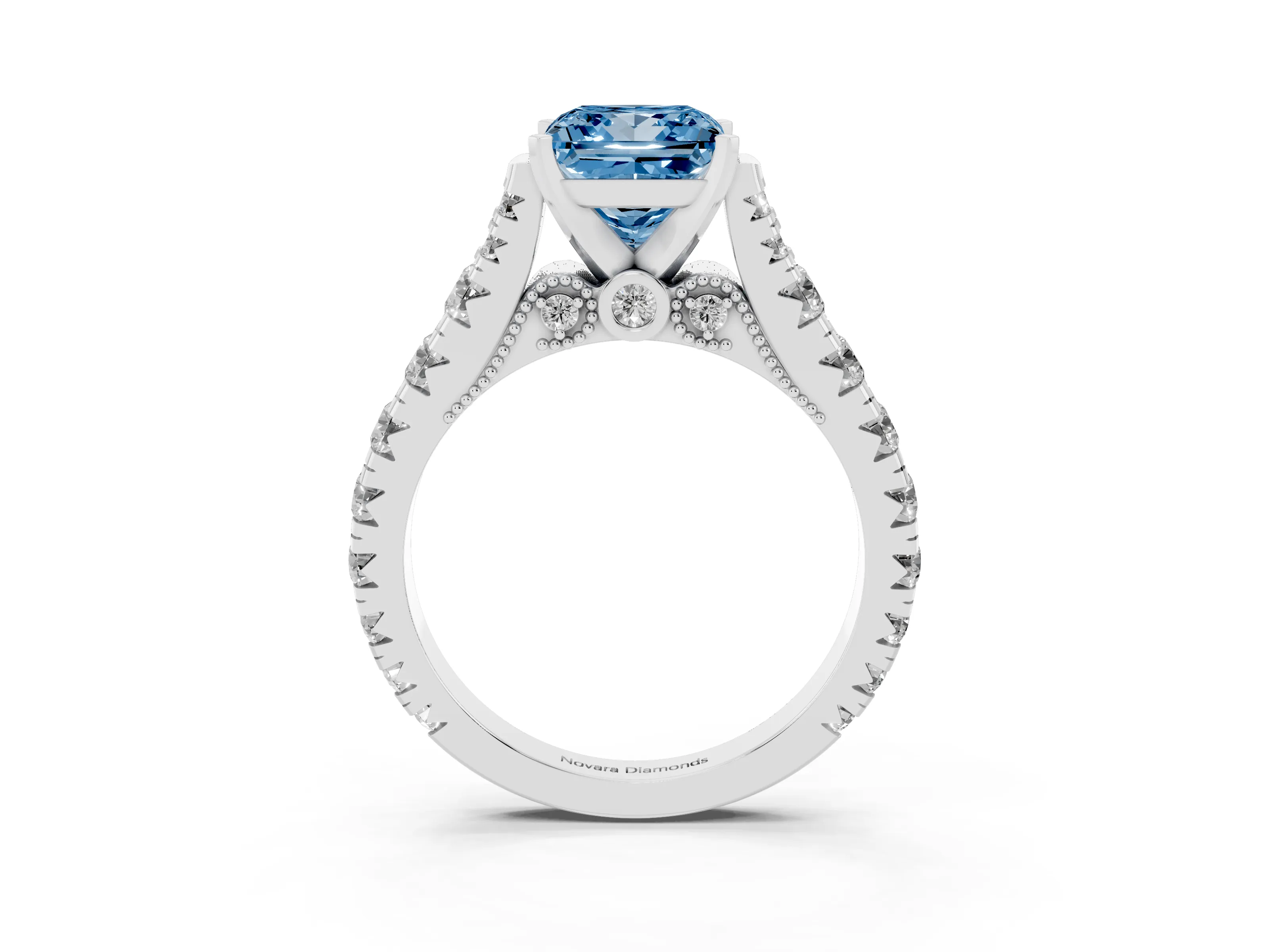Fancy Blue Princess Cut Diamond Classic Solitaire Ring Set in White gold with Pavé Band and Prong Setting