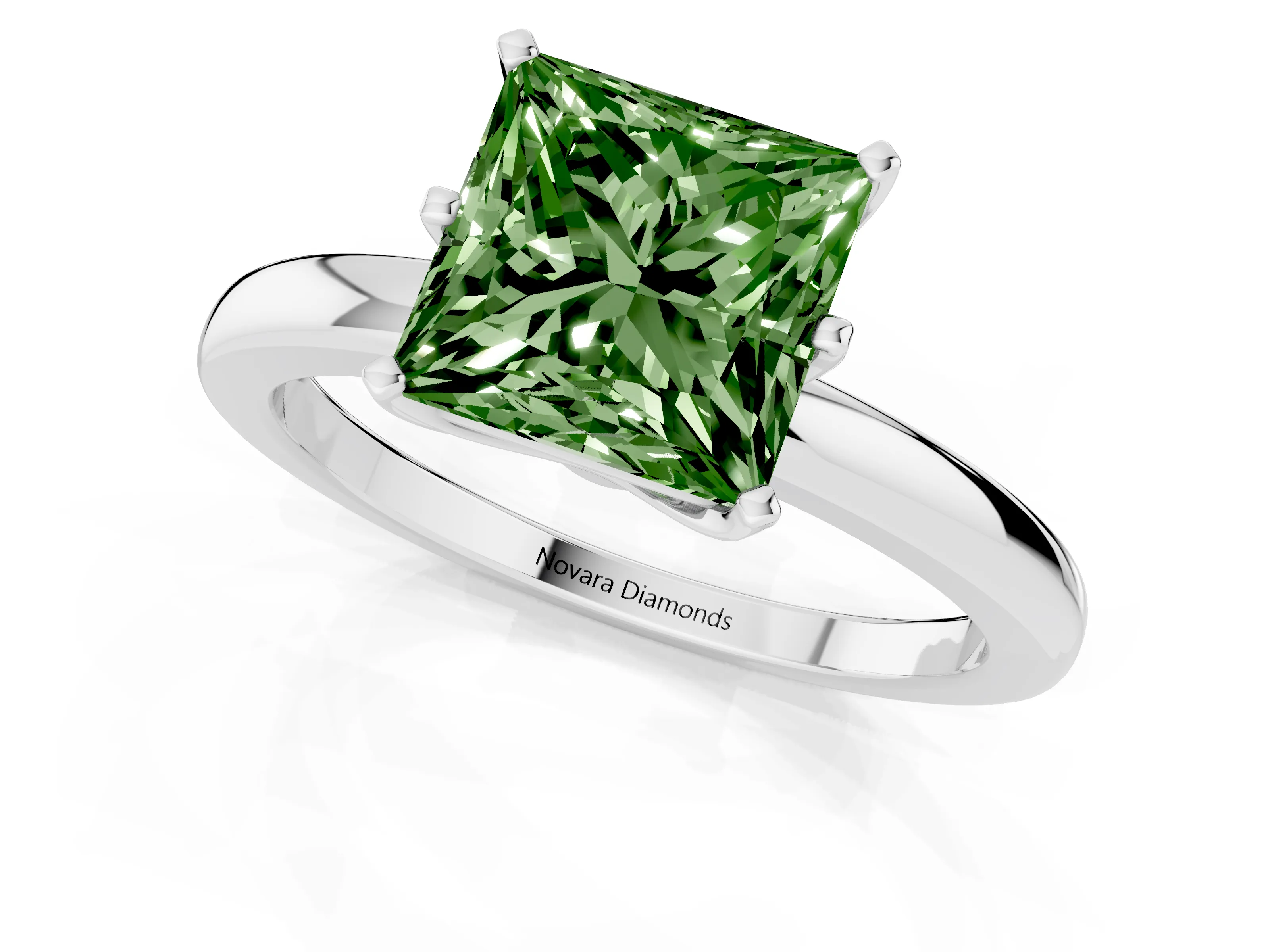 Fancy Green Princess Cut Diamond Solitaire Ring Set in White gold with Raised Prong Setting on a Classic Band
