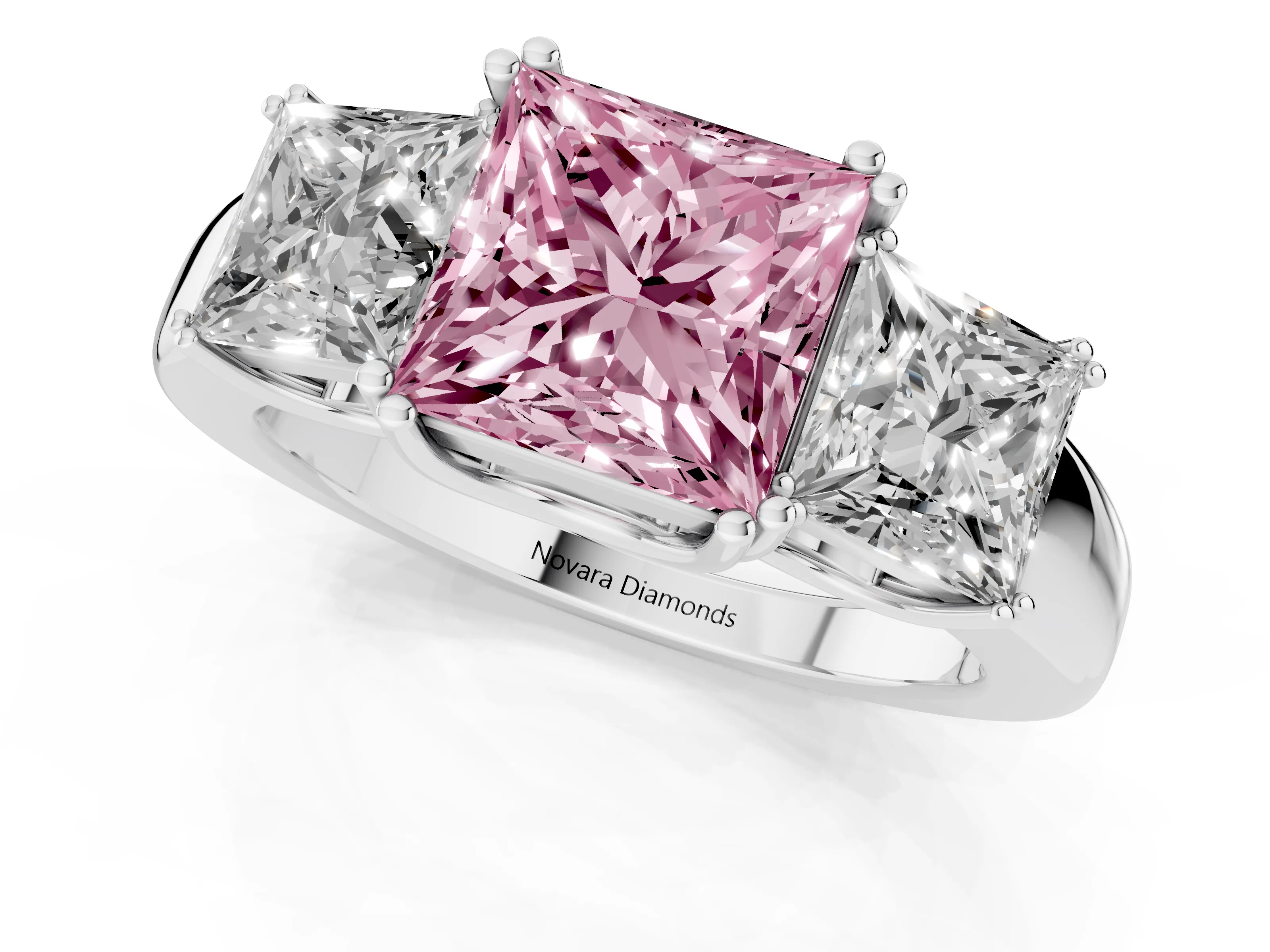 Fancy Pink Princess Cut Diamond Three-Stone Ring Set in Platinum with Polished Channel-Set Band