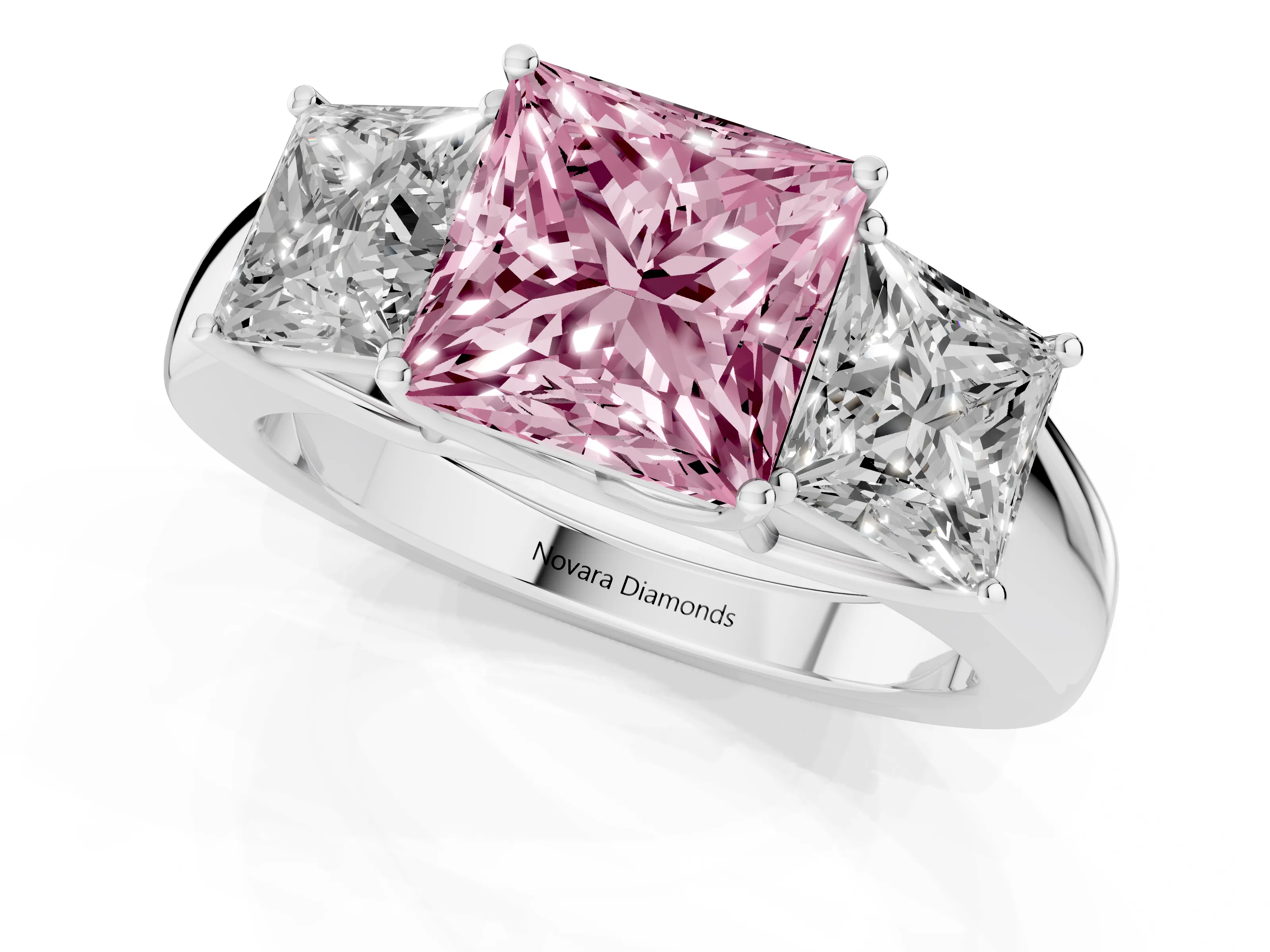 Fancy Pink Three-Stone Princess Cut Diamond Ring Set in Platinum with Matching Prong Settings and Plain Band