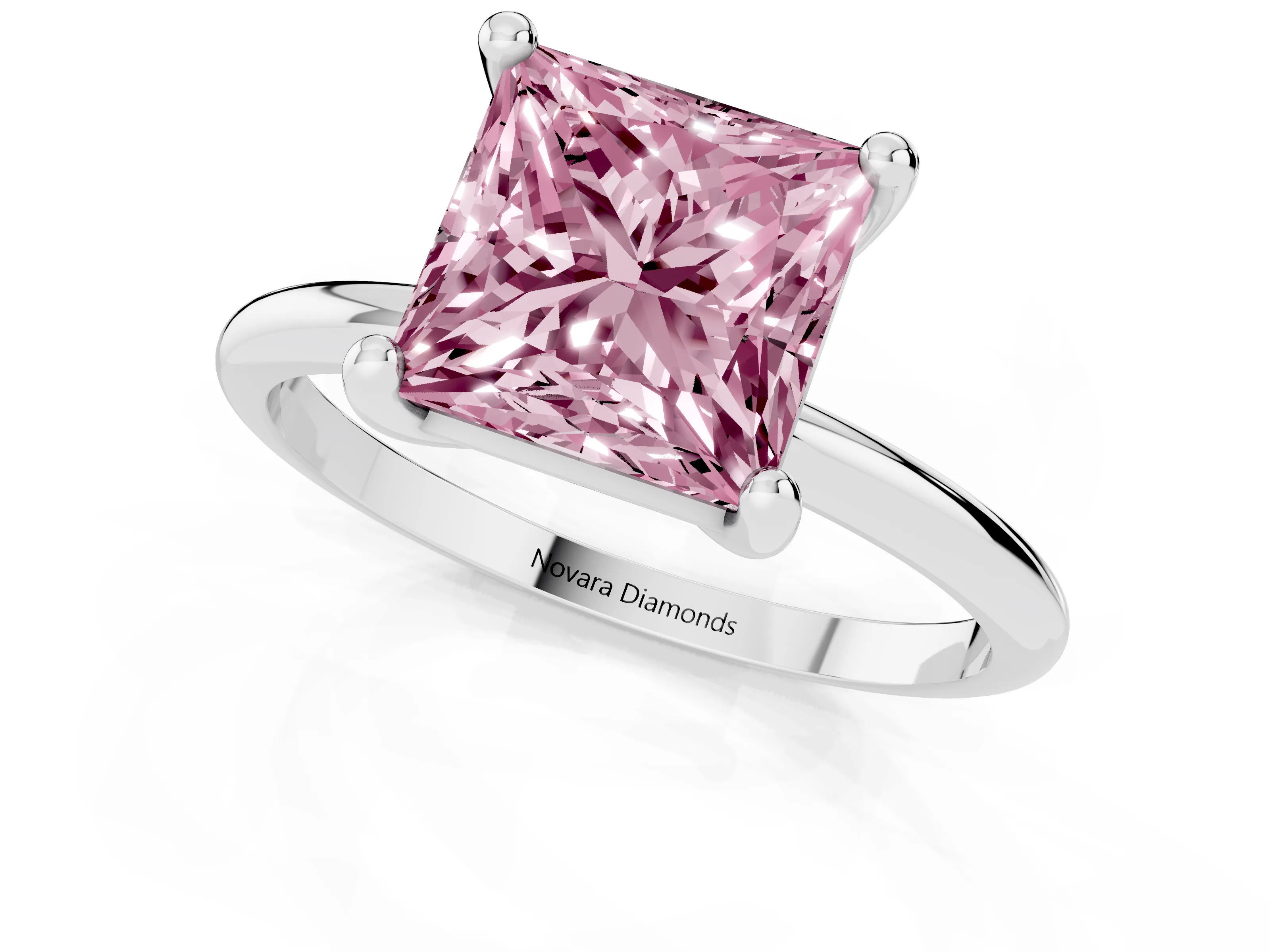 Fancy Pink Princess Cut Diamond Solitaire Ring Set in White gold with Secure Prong Setting on a Classic Band