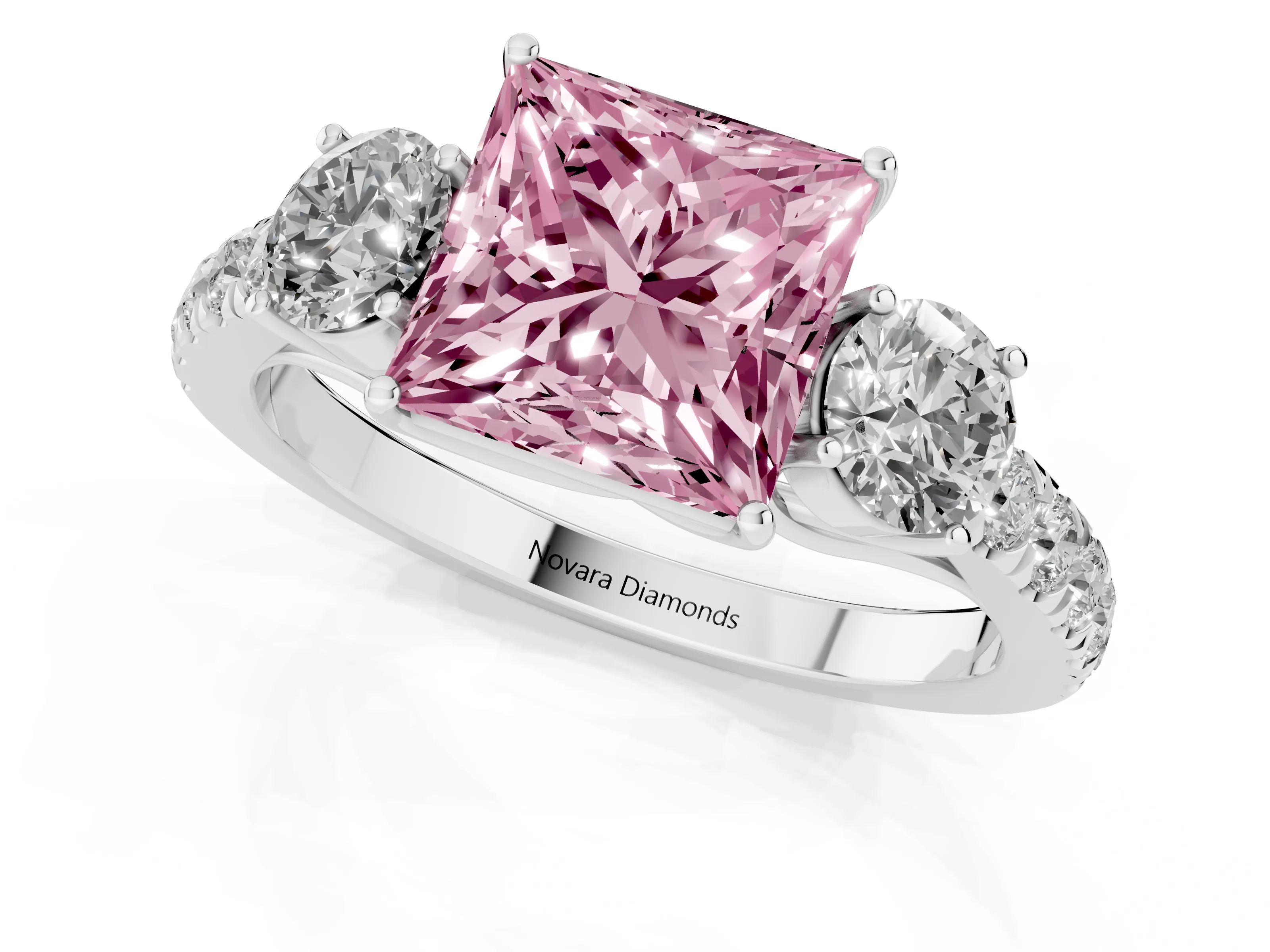 Fancy Pink Princess Cut Diamond Three-Stone Ring Set in Silver with Round Side Stones and Delicate Pavé Band