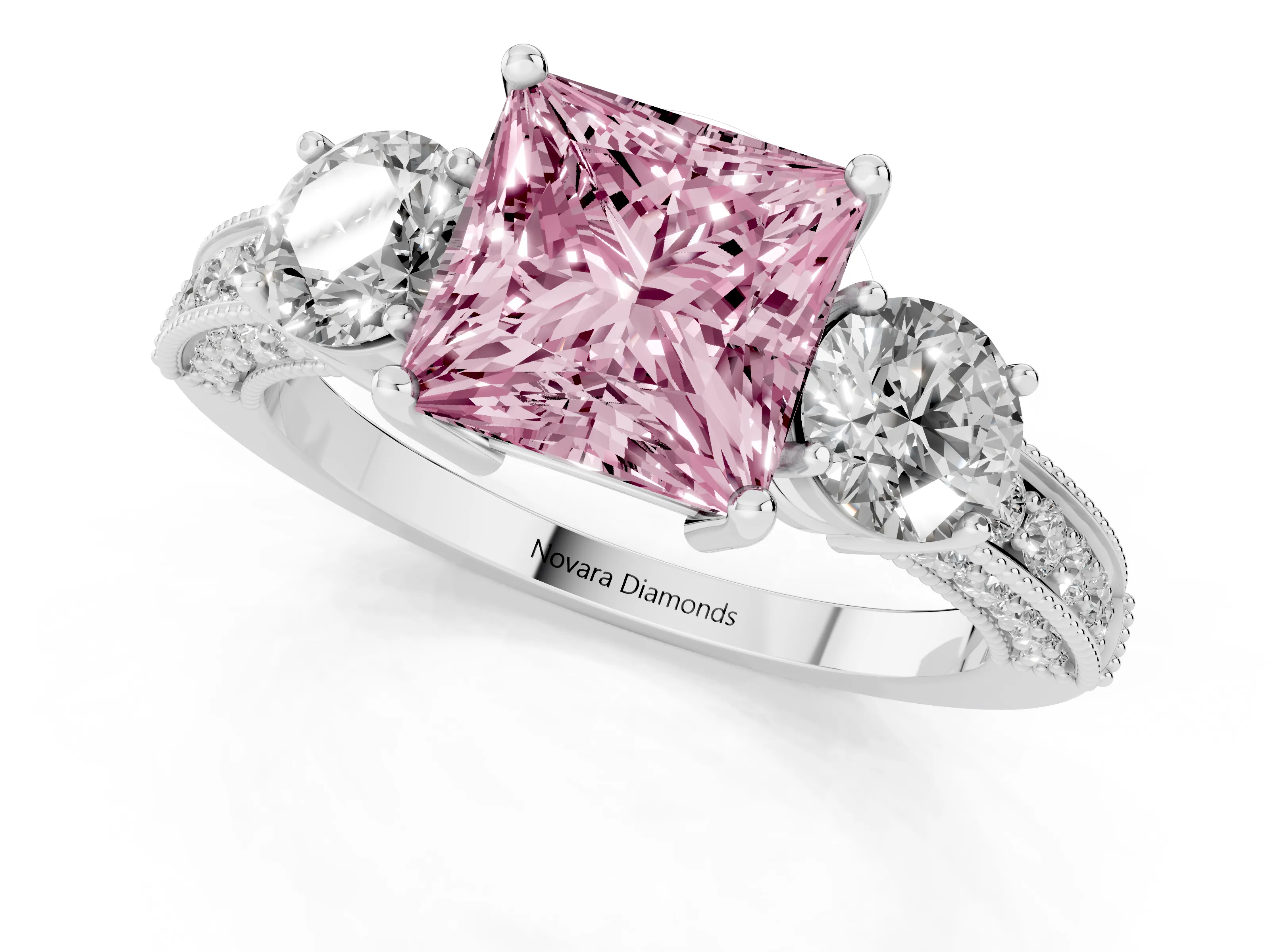 Fancy Pink Princess Cut Diamond Three-Stone Ring Set in Platinum with Round Side Stones and Pavé Band