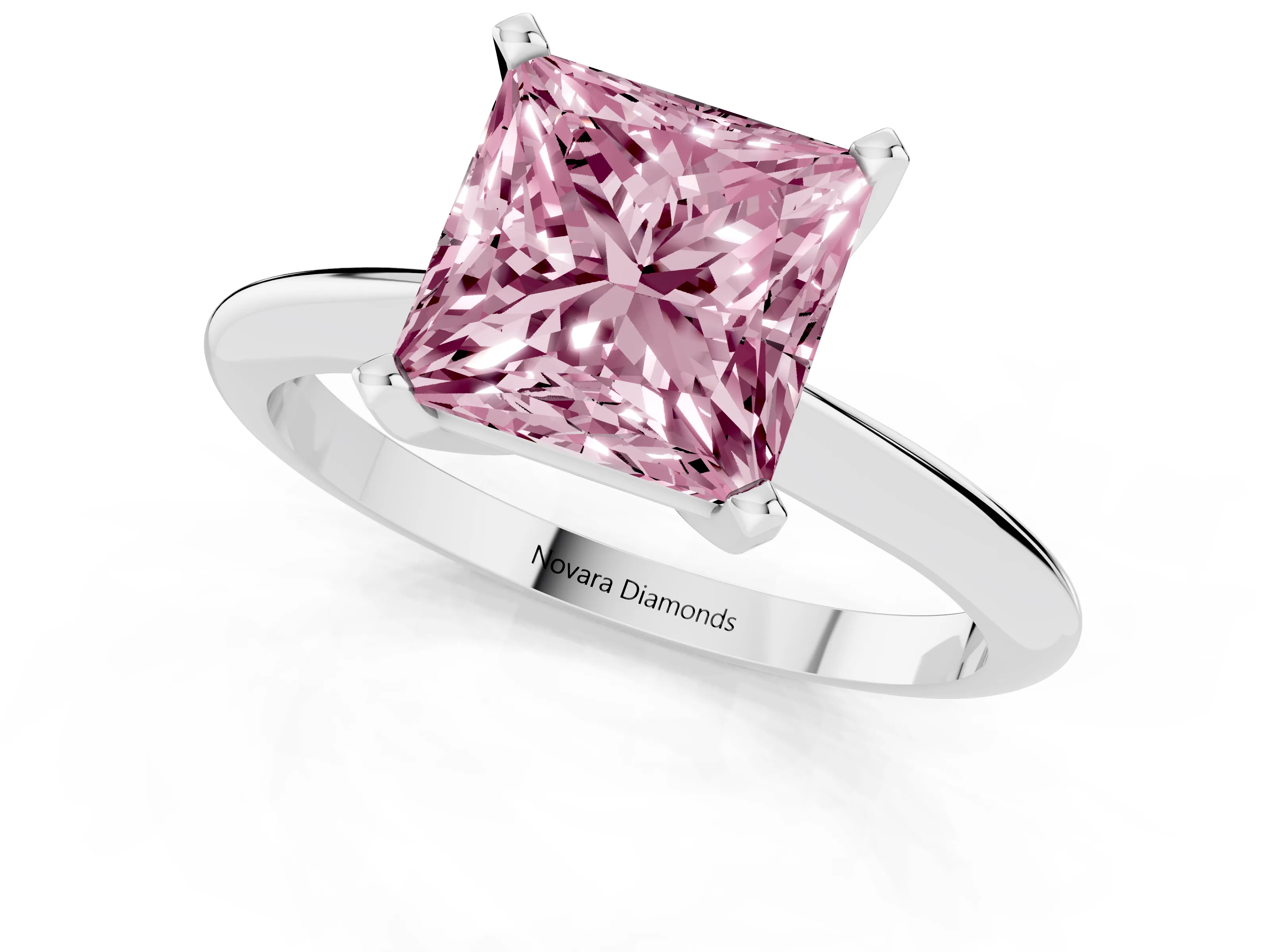 Fancy Pink Princess Cut Diamond Solitaire Ring Set in Silver with Prong Setting on a Plain Round Band