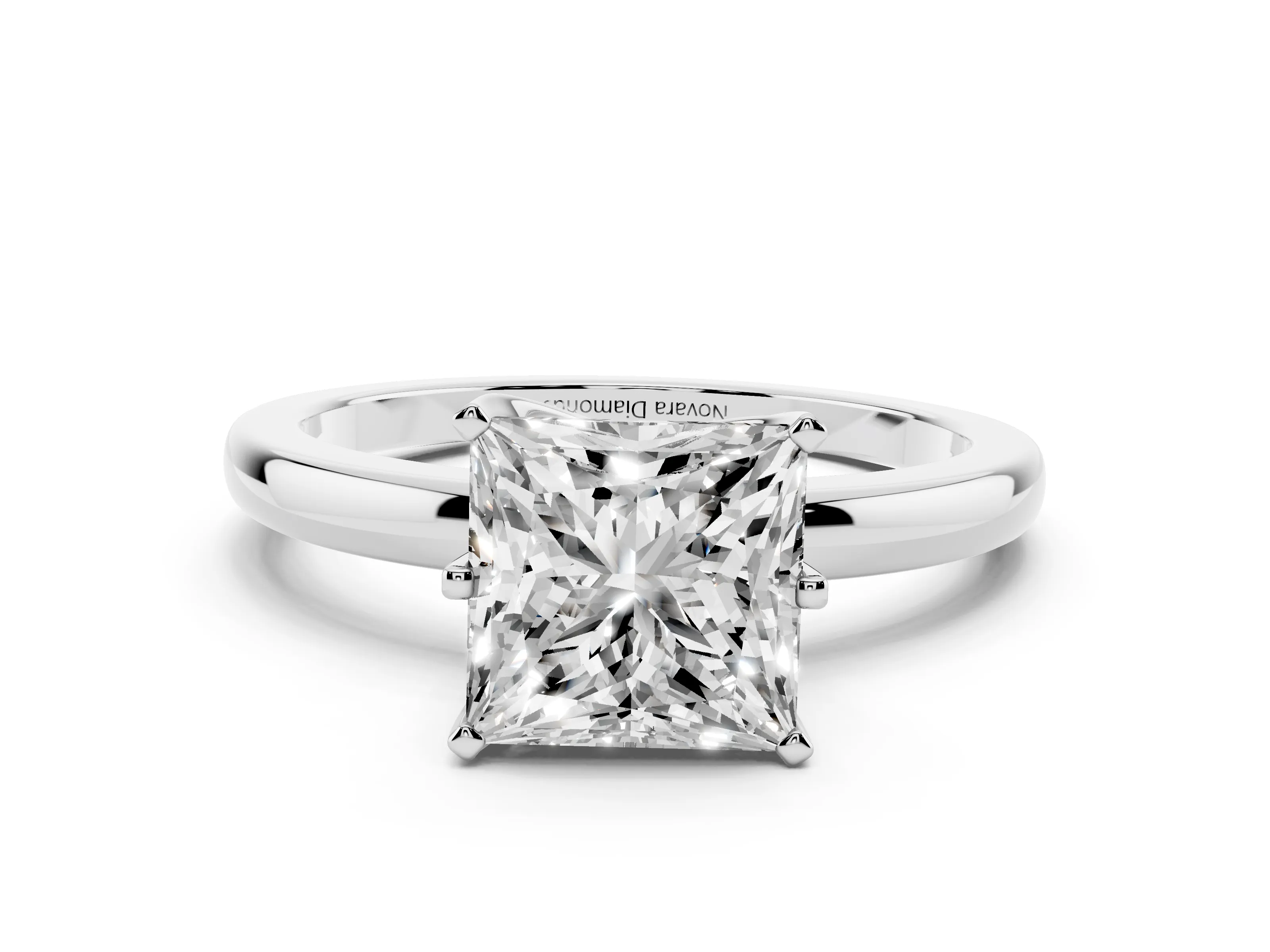 Princess Cut Diamond Solitaire Ring Set in Platinum with Raised Prong Setting on a Classic Band