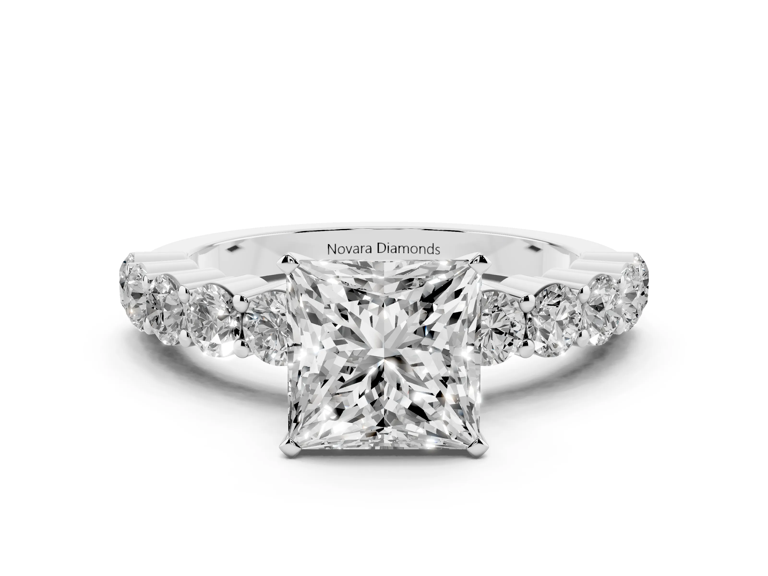 Princess Cut Diamond Solitaire Ring Set in Platinum with Shared Prong Round Side Stones