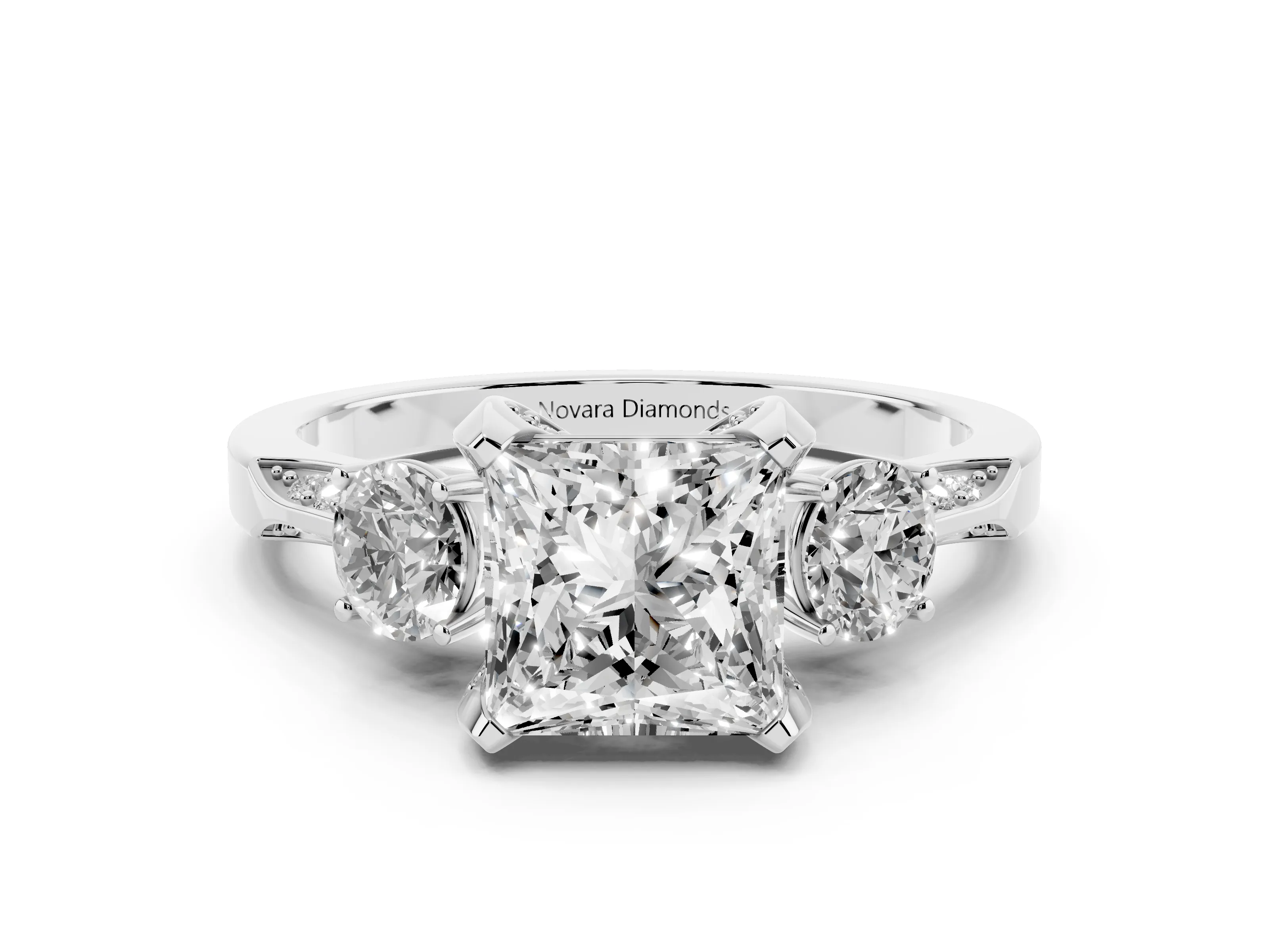 Princess Cut Diamond Three-Stone Ring Set in Platinum with Pavé Band and Smaller Side Stones