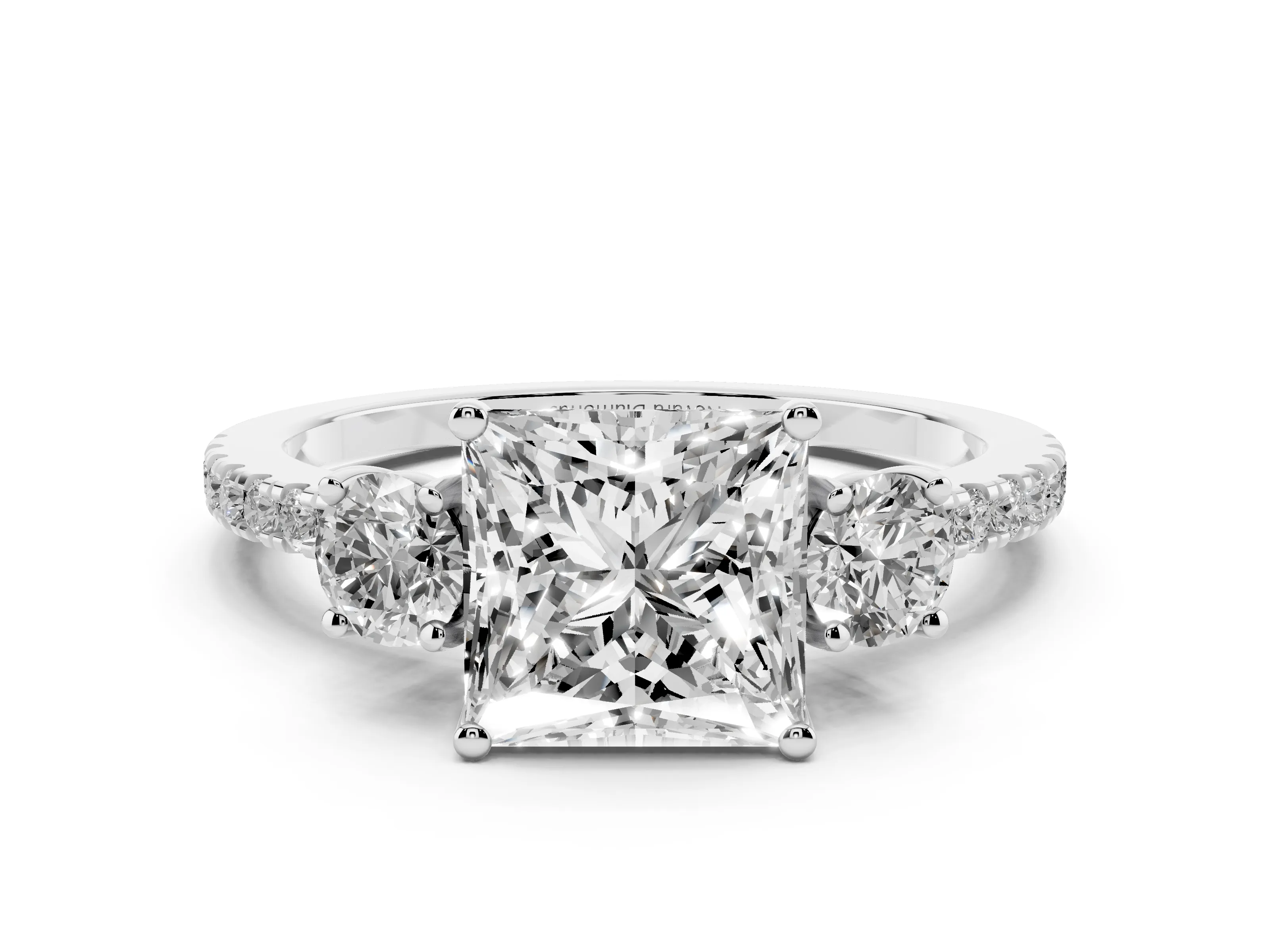 Princess Cut Diamond Three-Stone Ring Set in White gold with Pavé Band and Graduated Sides