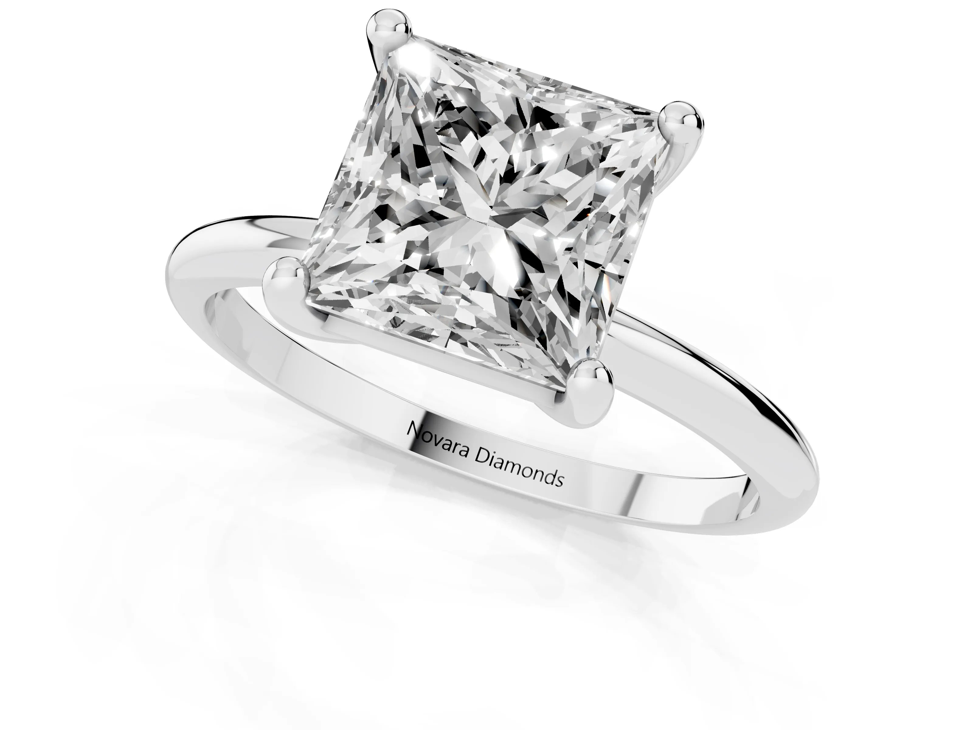 Princess Cut Diamond Solitaire Ring Set in White gold with Secure Prong Setting on a Classic Band