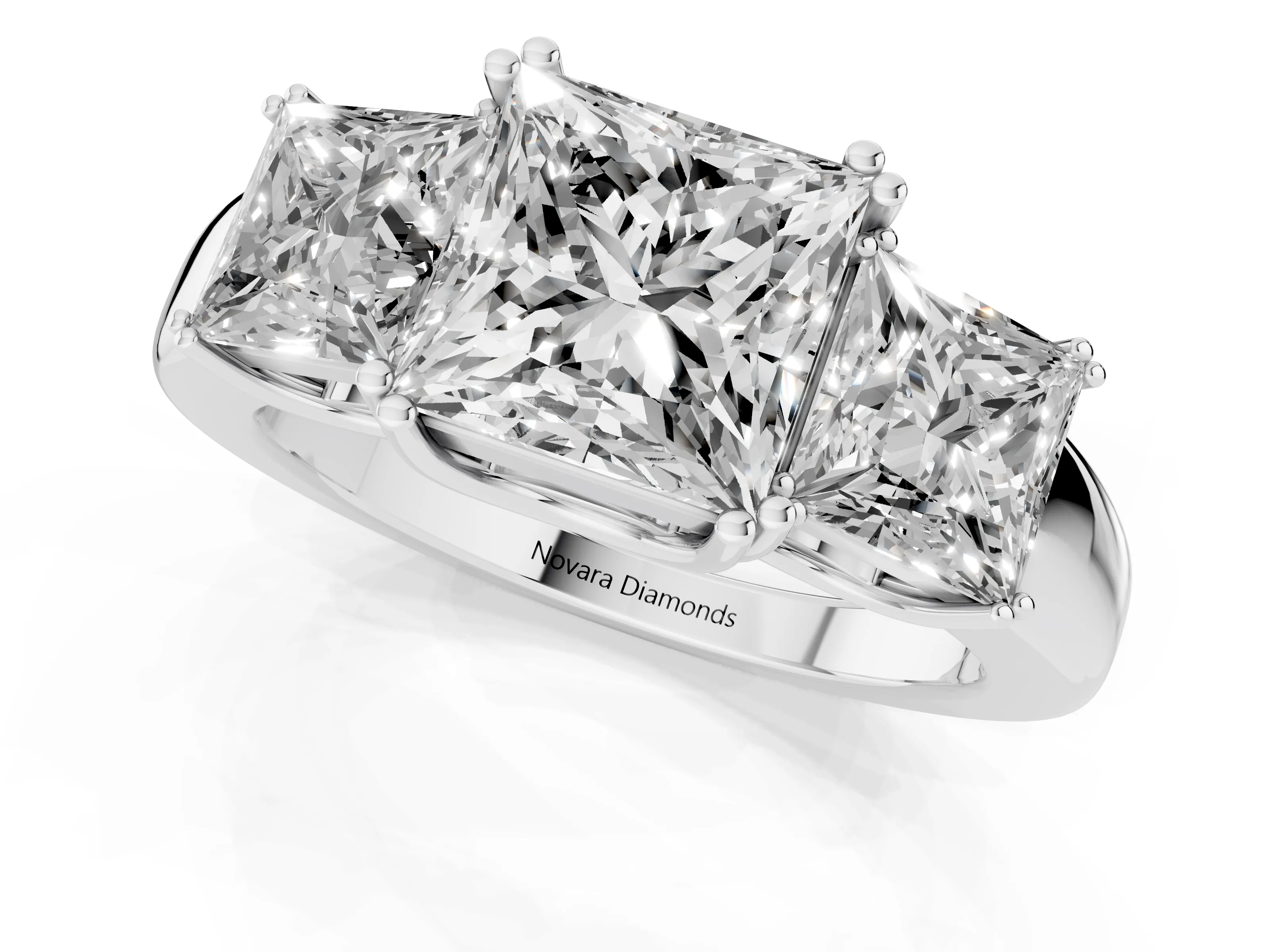 Princess Cut Diamond Three-Stone Ring Set in White gold with Polished Channel-Set Band