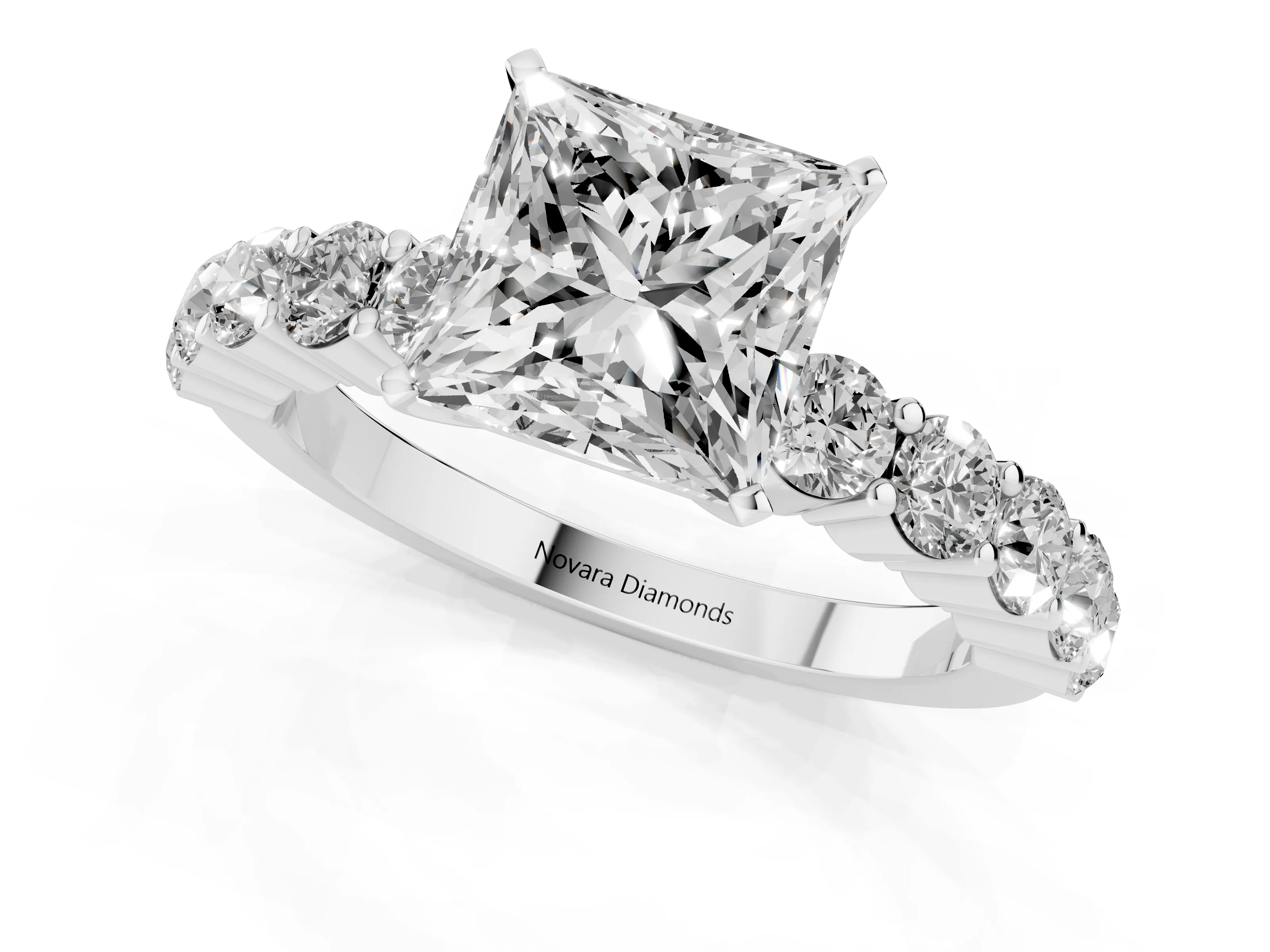 Princess Cut Diamond Solitaire Ring Set in Silver with Shared Prong Round Side Stones