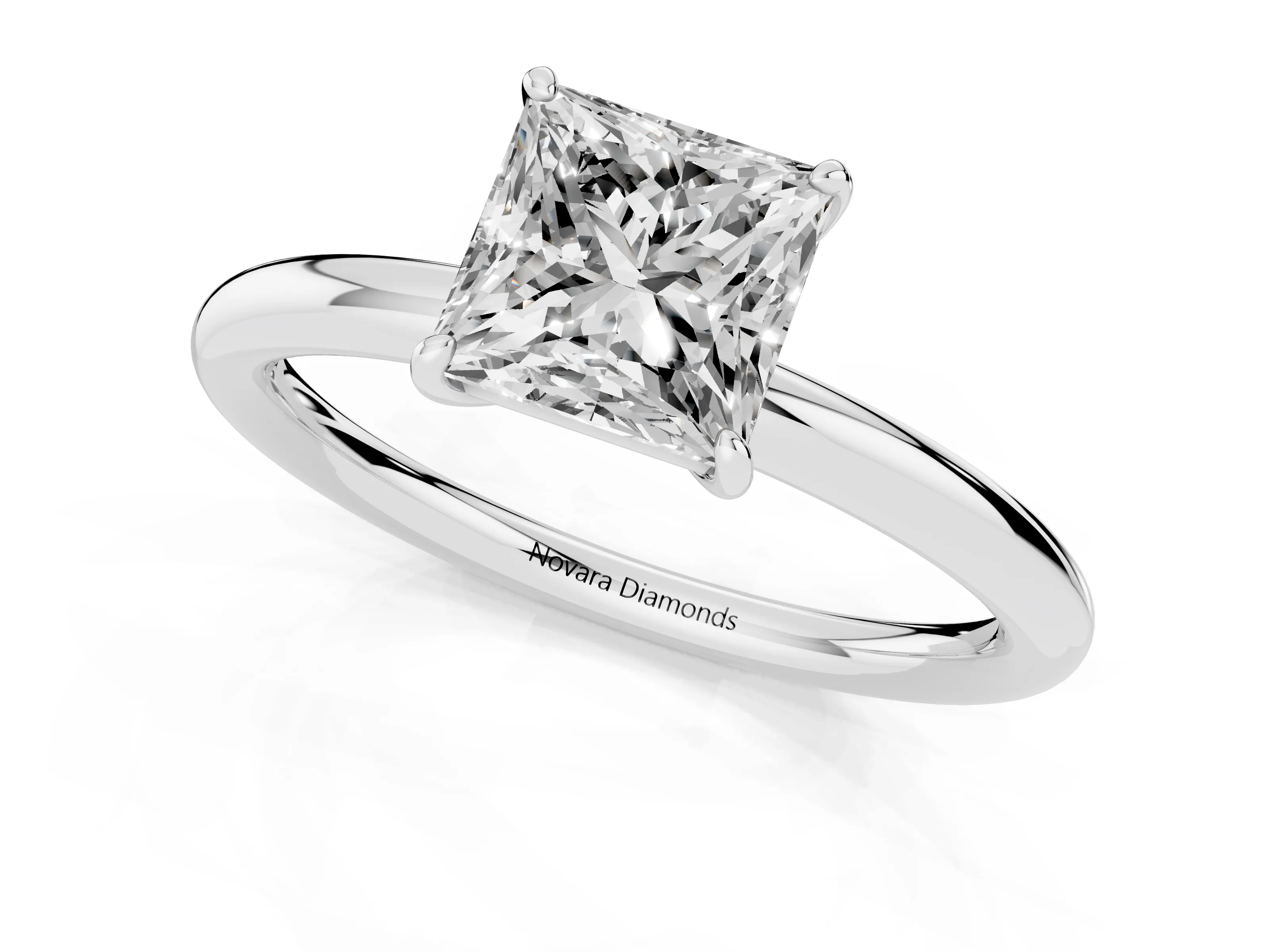 Princess Cut Diamond Solitaire Ring Set in White gold with Prong Setting on a Polished Plain Band