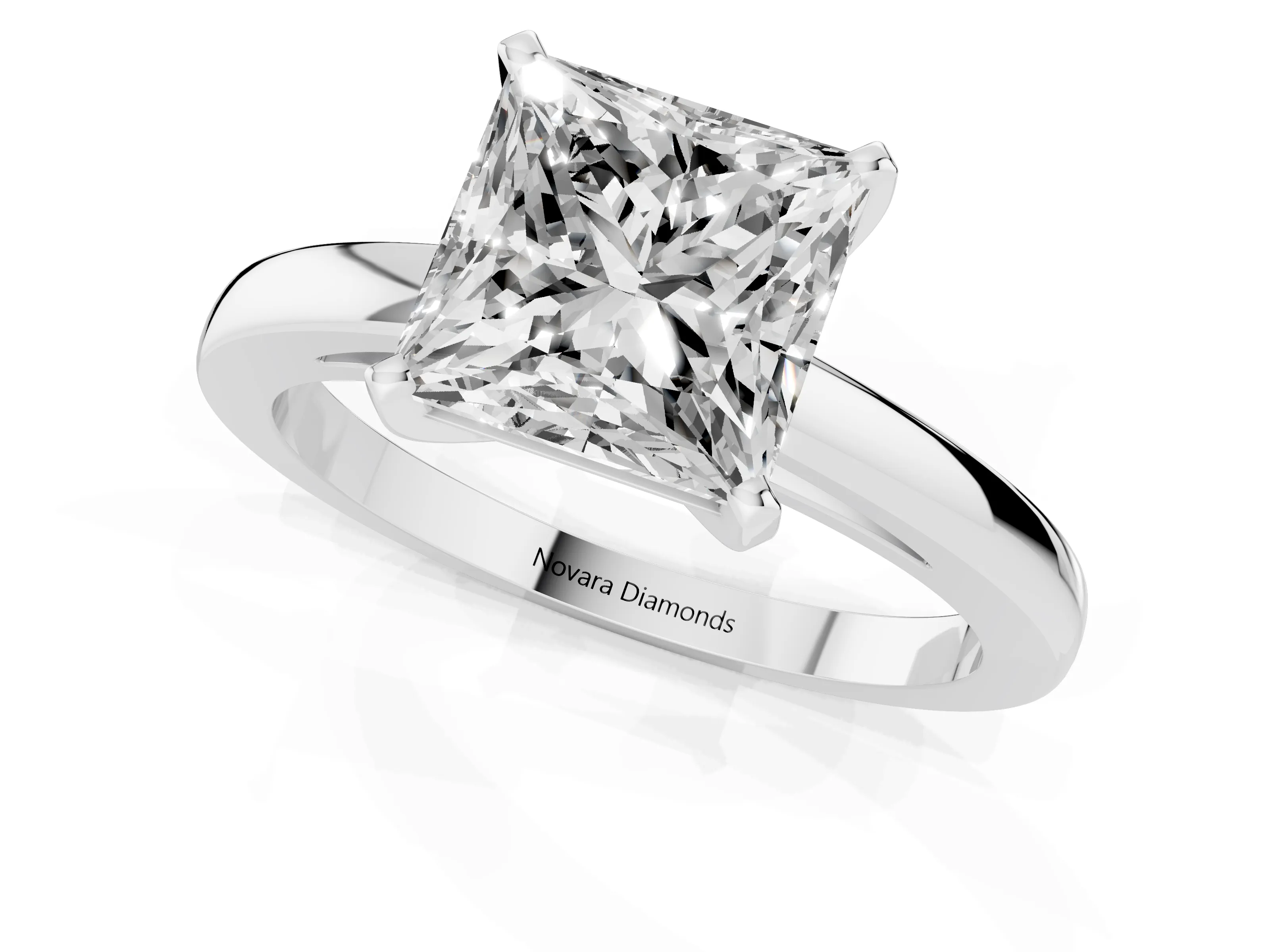 Princess Cut Diamond Solitaire Engagement Ring Set in White gold with Prong Setting on a Classic Band