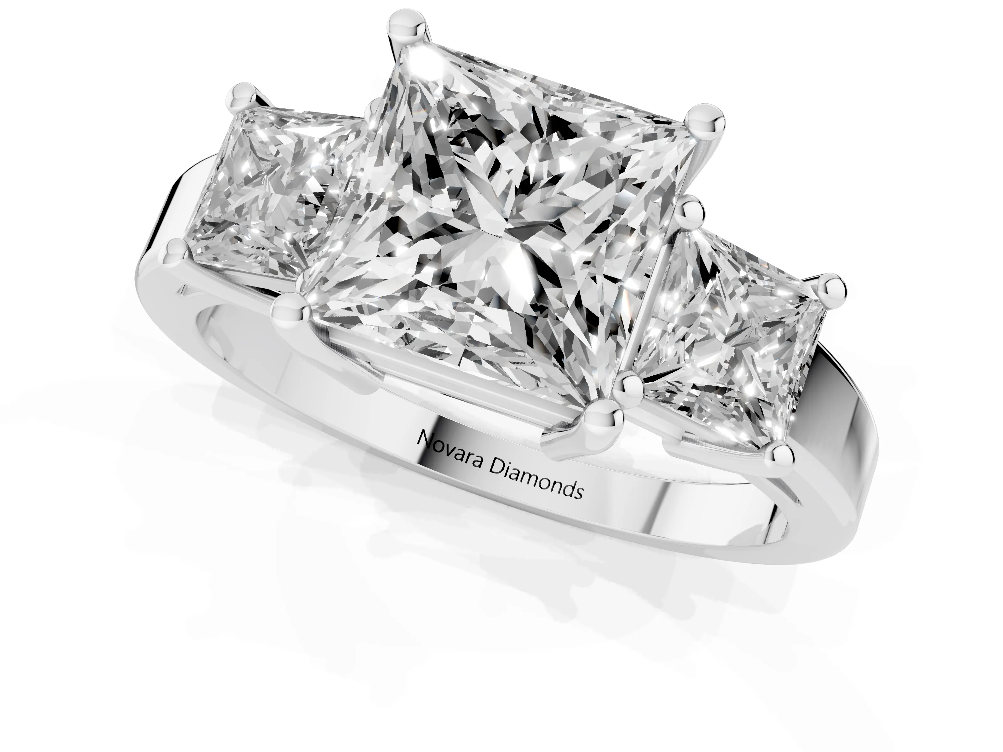 Three-Stone Princess Cut Diamond Solitaire Ring Set in Platinum with Prong Setting