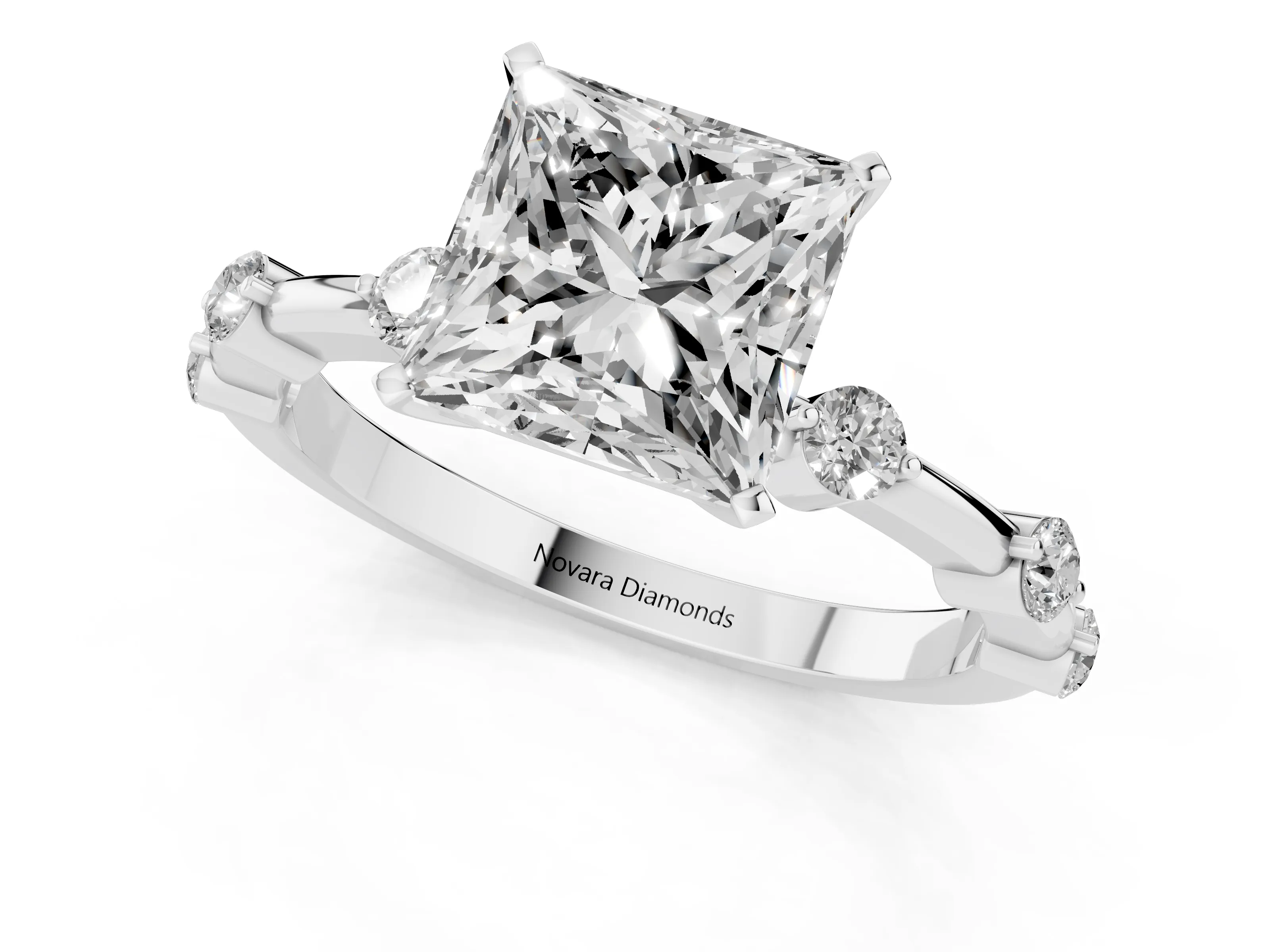 Princess Cut Diamond Solitaire Ring Set in Silver with Bezel Set Side Stones and Prong Setting