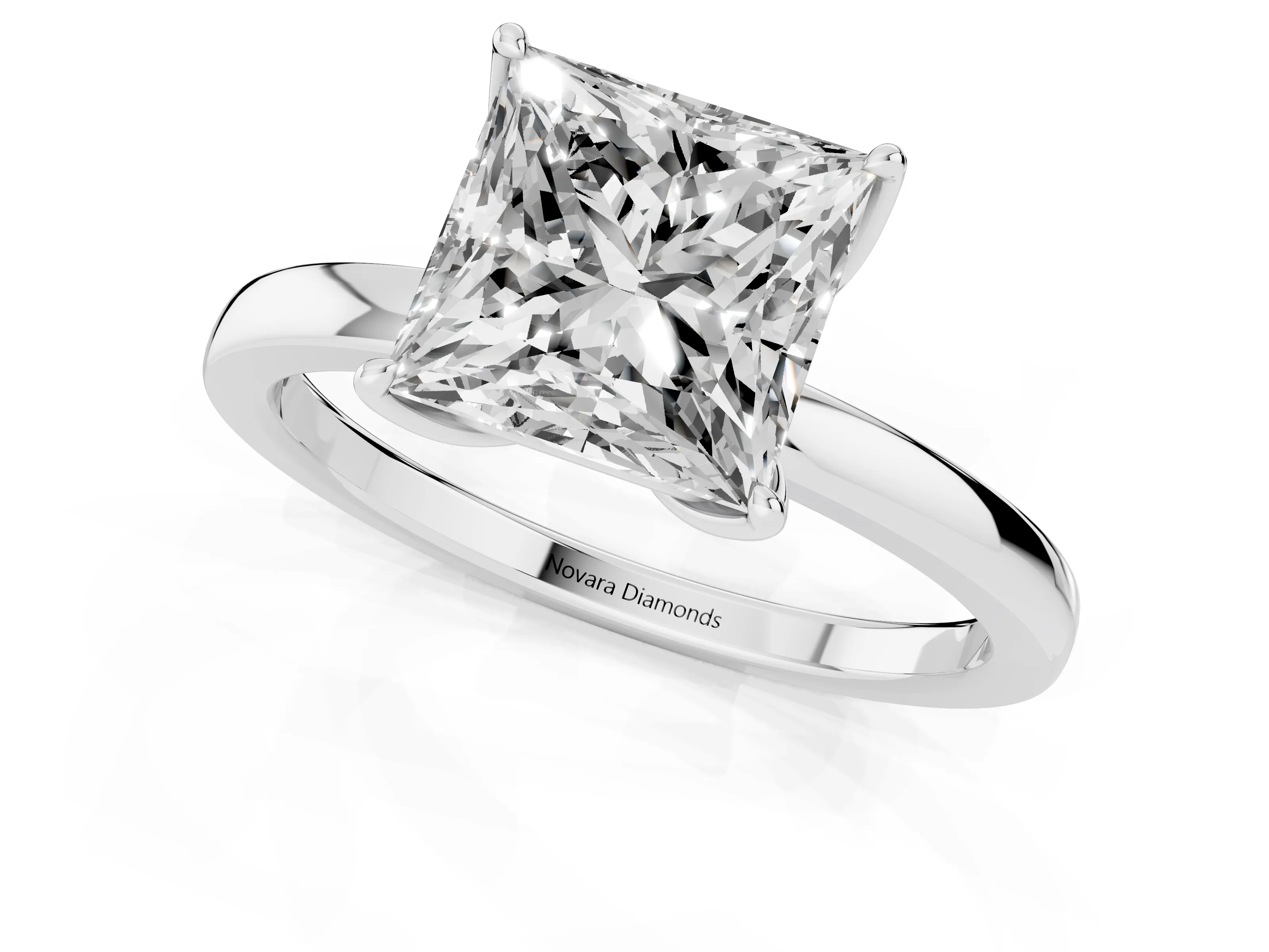 Princess Cut Diamond Solitaire Ring Set in White gold with Prong Setting and Thin Polished Band