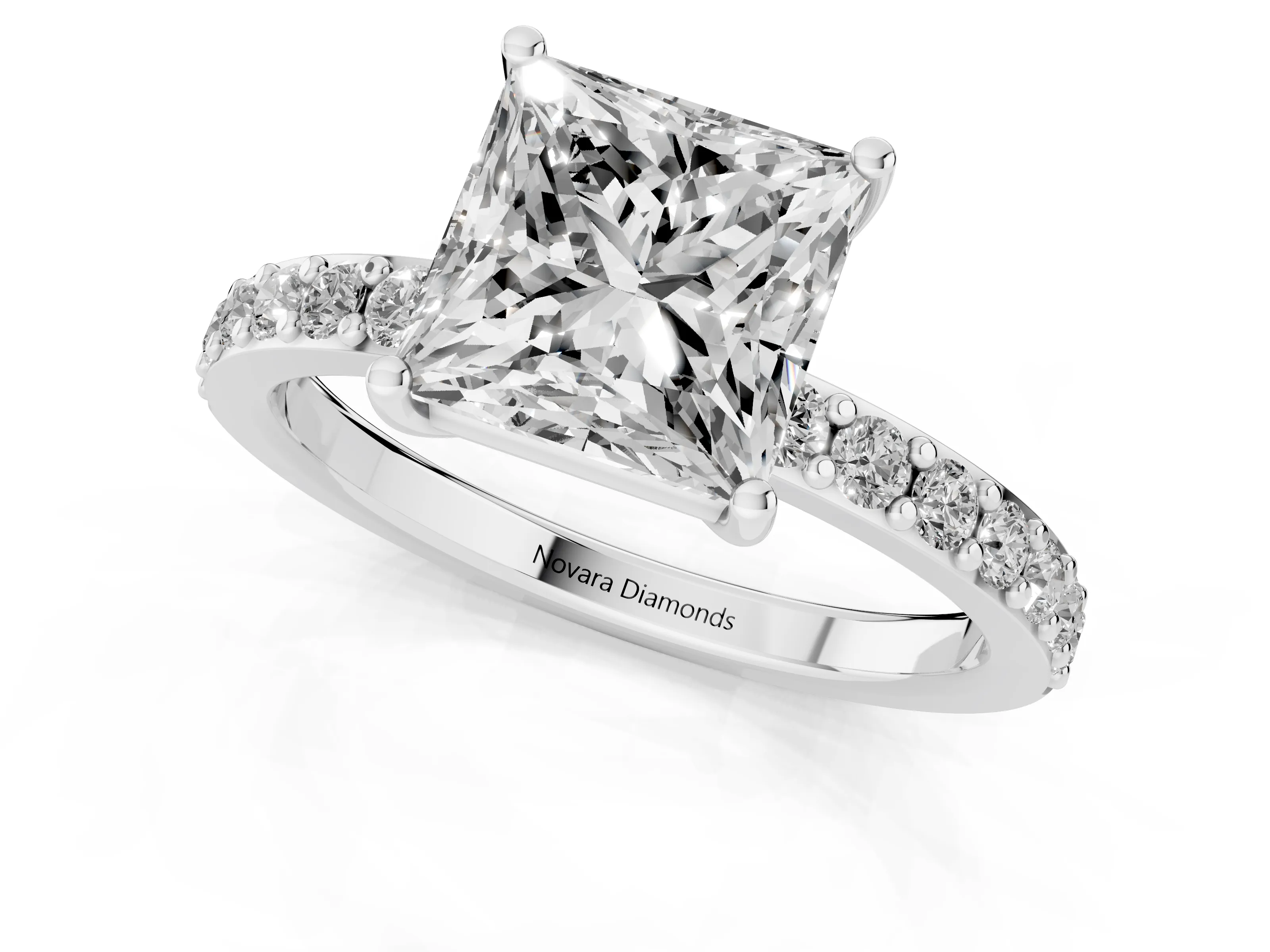 Princess Cut Diamond Solitaire Set in Platinum with Round Pavé Band and Prong Setting