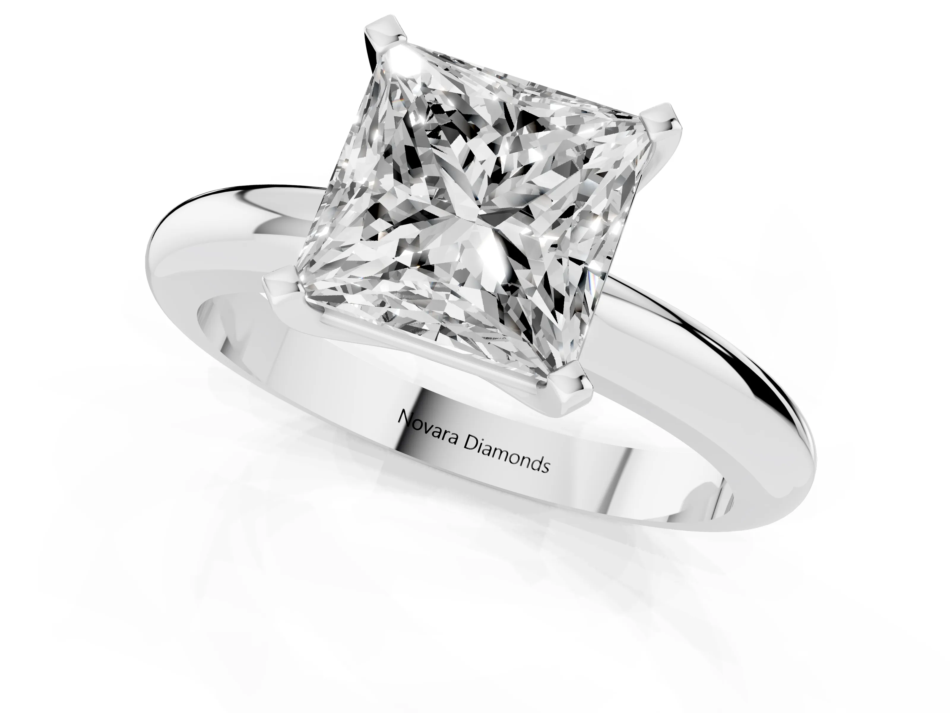 Princess Cut Diamond Solitaire Engagement Ring Set in Platinum with Round Band and Prong Setting