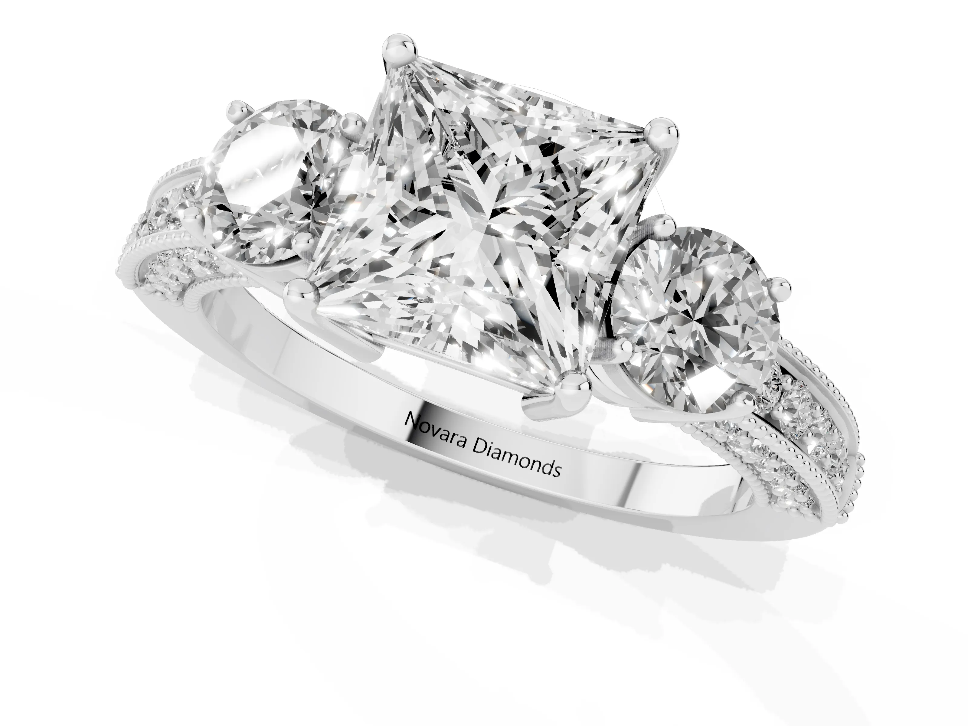 Princess Cut Diamond Three-Stone Ring Set in White gold with Round Side Stones and Pavé Band