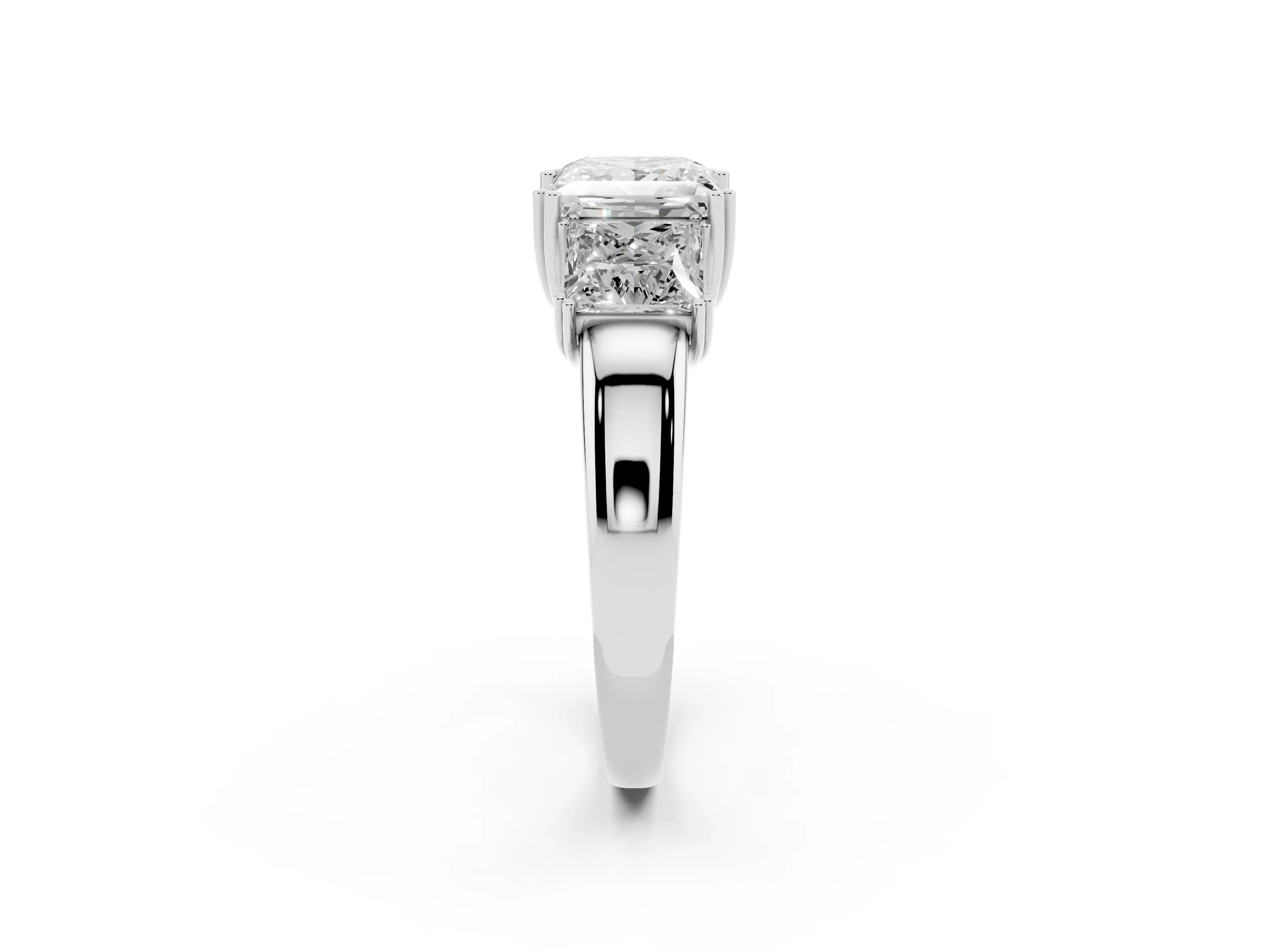 Princess Cut Diamond Three-Stone Ring Set in White gold with Polished Channel-Set Band