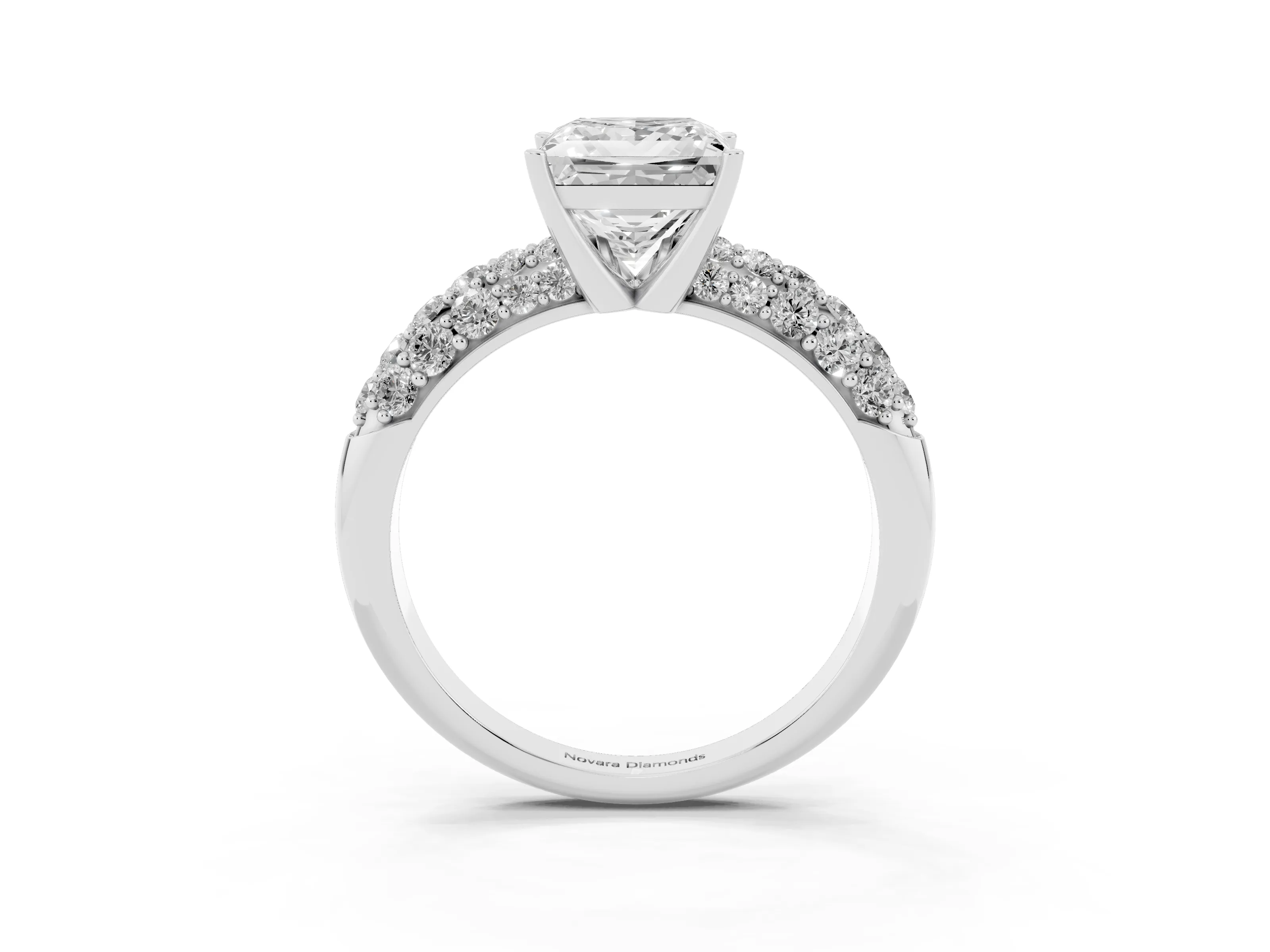 Princess Cut Diamond Pavé Band Solitaire Ring Set in White gold with Close-Set Accent Stones and Prong Setting
