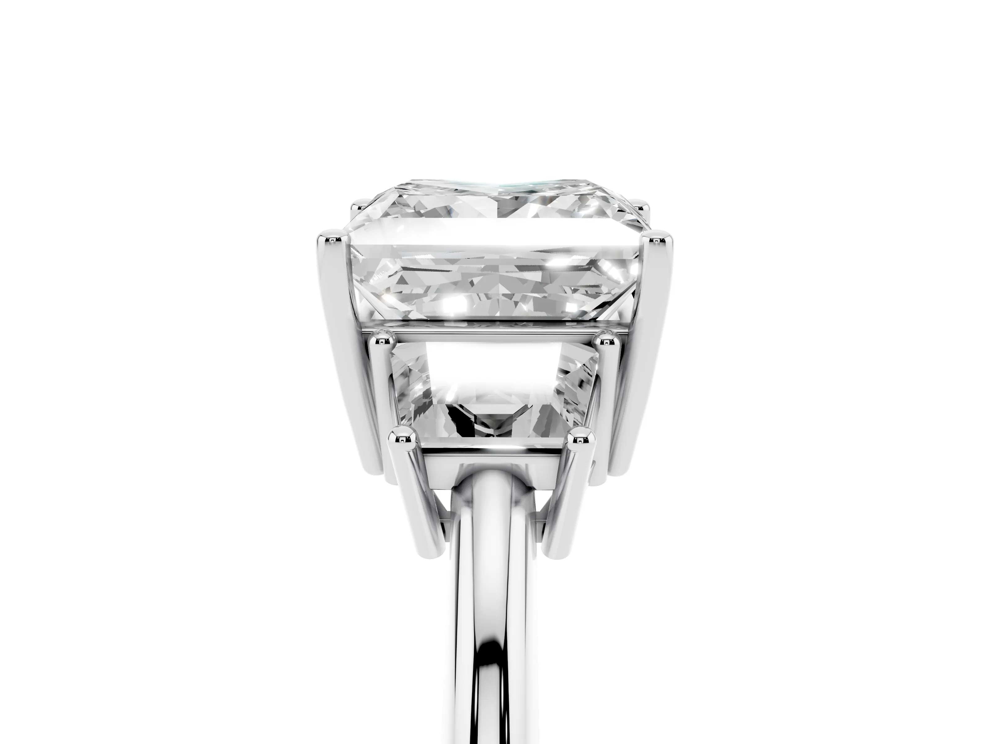 Princess Cut Diamond Three-Stone Ring Set in Platinum with Trapezoid Side Stones and Prong Setting
