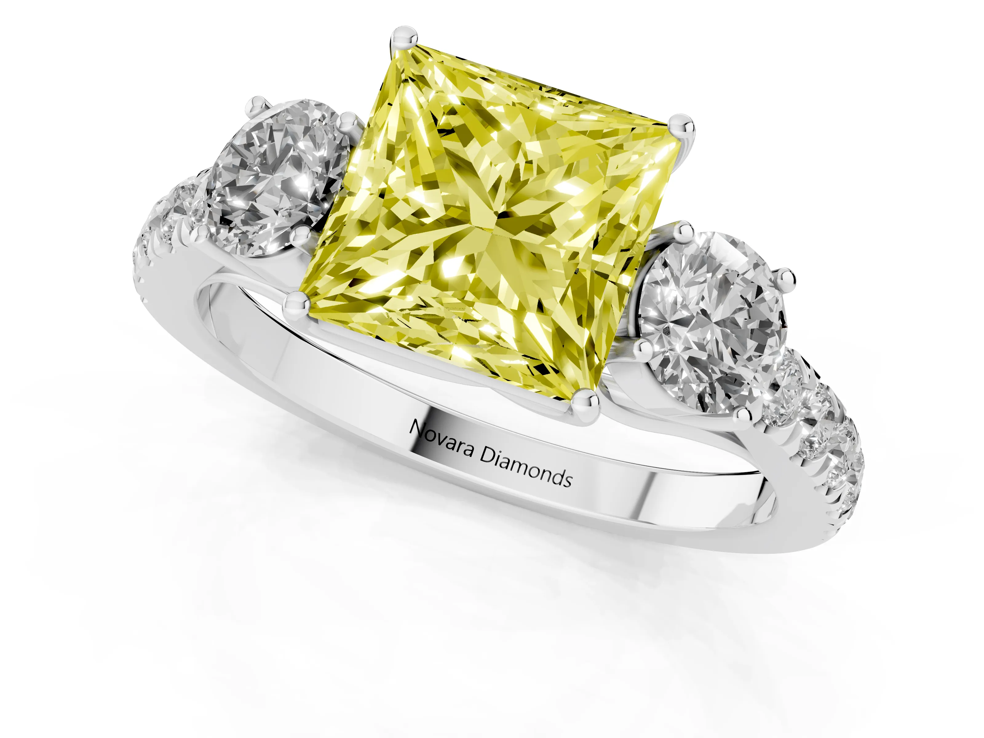 Fancy Yellow Princess Cut Diamond Three-Stone Ring Set in Silver with Round Side Stones and Delicate Pavé Band