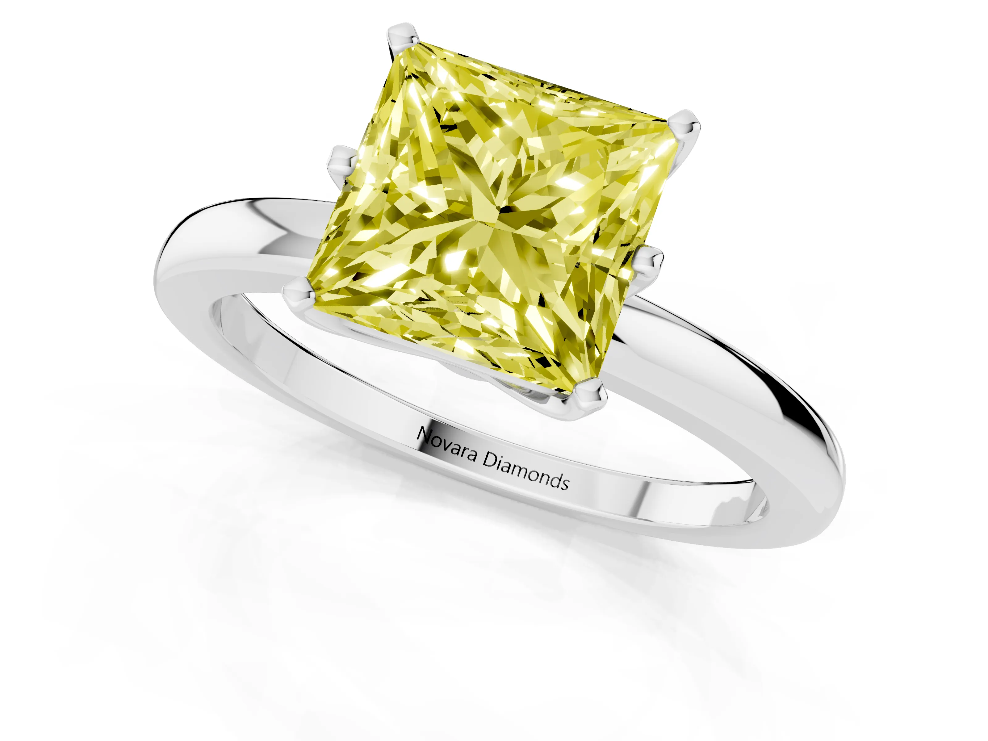 Fancy Yellow Princess Cut Diamond Solitaire Ring Set in White gold with Raised Prong Setting on a Classic Band