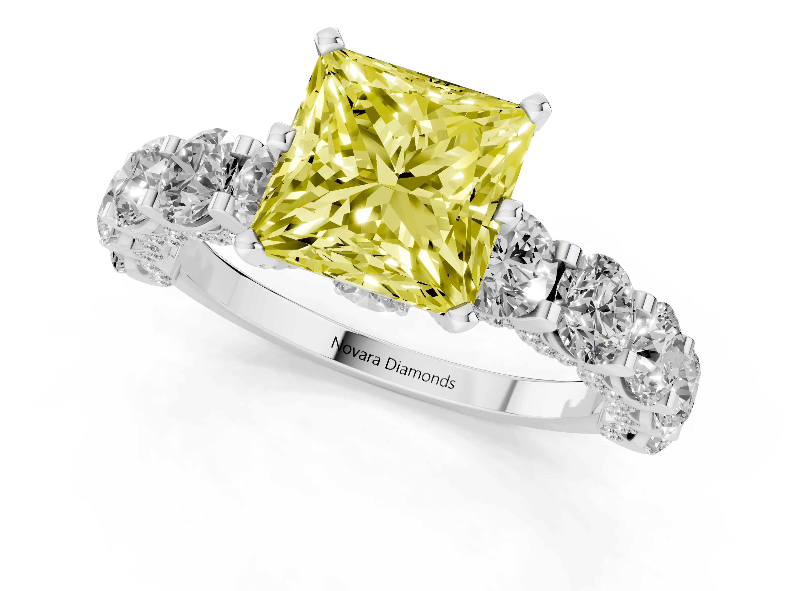 Fancy Yellow Princess Cut Diamond Side Stone Ring Set in Silver with Alternating Round and Oval Side Stones