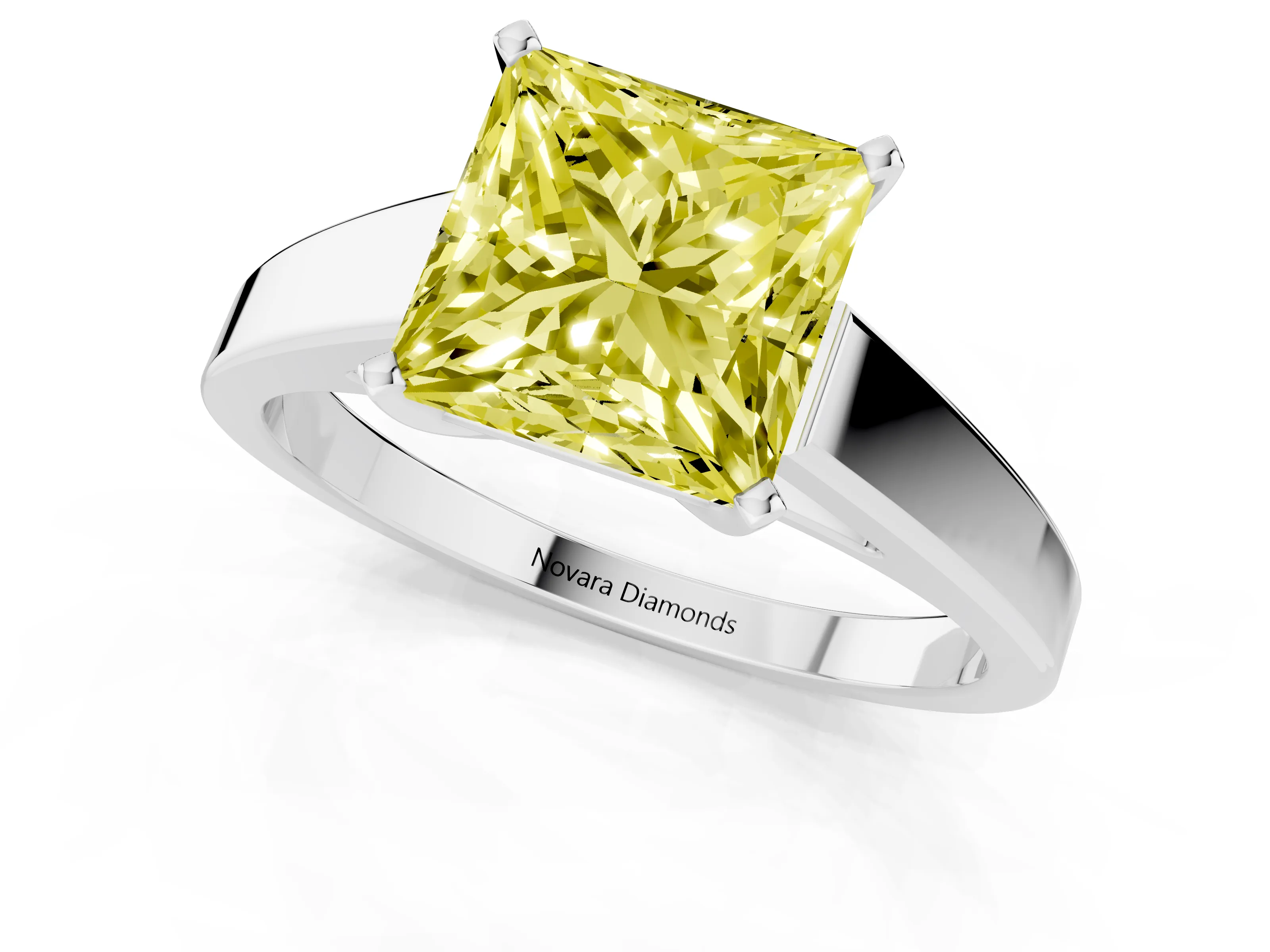 Fancy Yellow Princess Cut Diamond Solitaire Engagement Ring Set in White gold with Prong Setting and Tapered Band