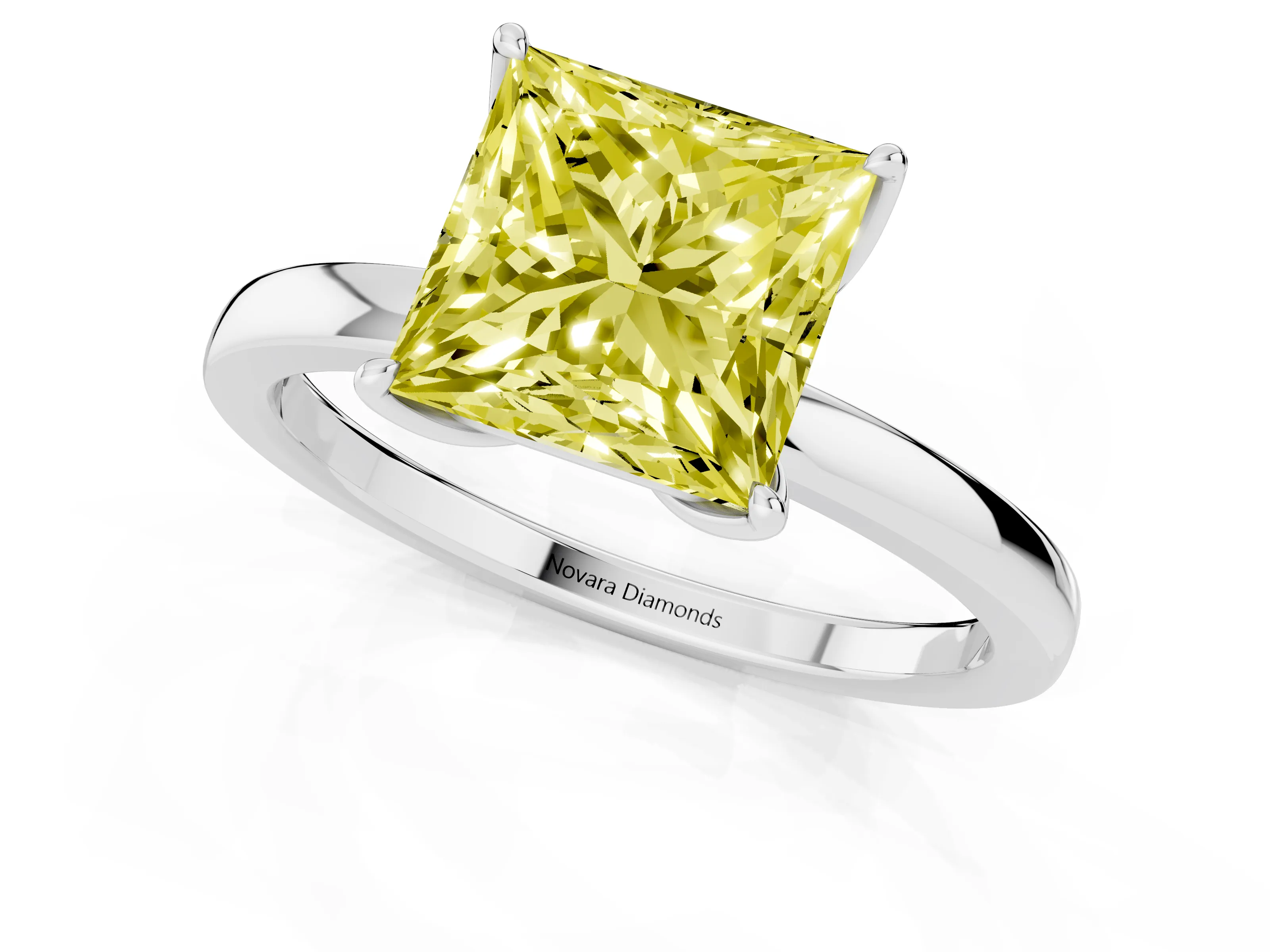 Fancy Yellow Princess Cut Diamond Solitaire Ring Set in White gold with Prong Setting and Thin Polished Band