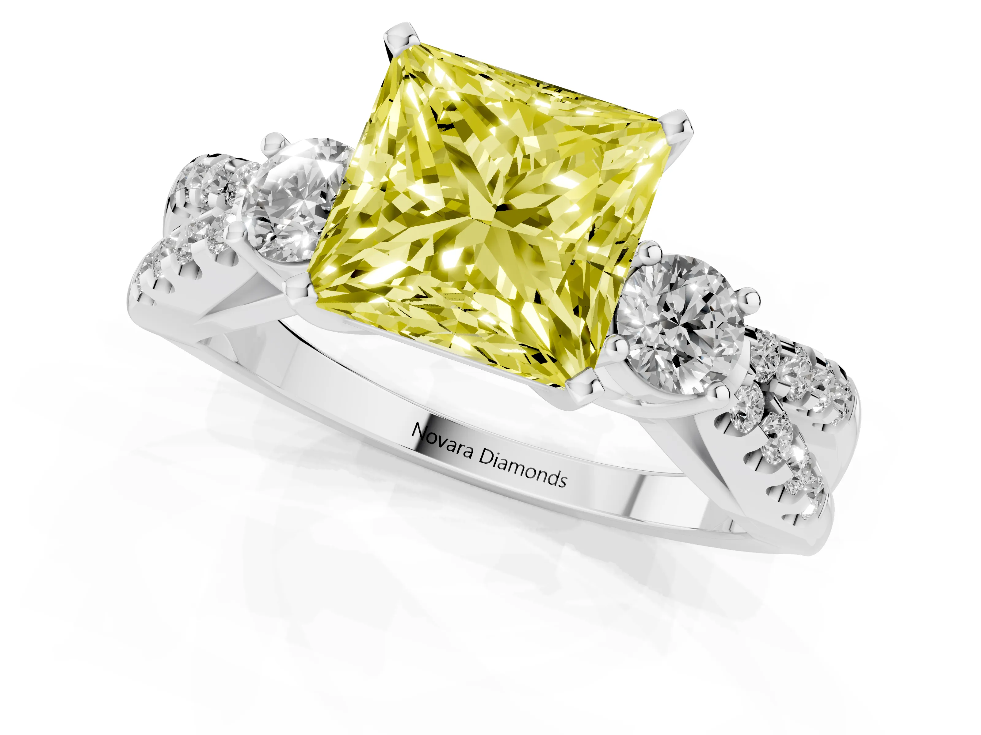 Fancy Yellow Princess Cut Diamond Three-Stone Ring Set in White gold with Pavé Split Shank and Prong Setting