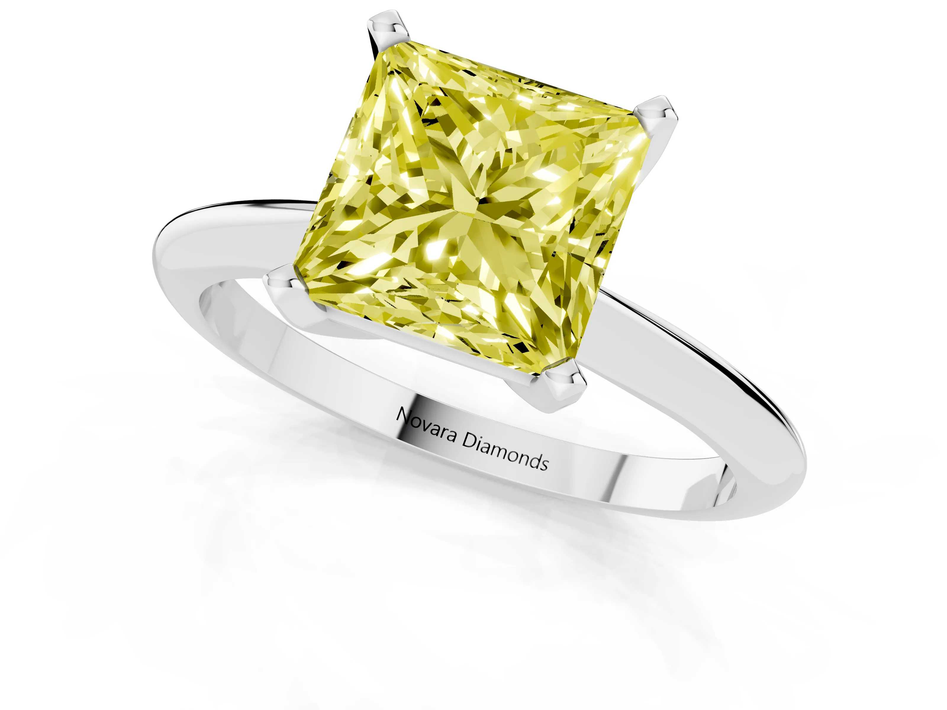 Fancy Yellow Princess Cut Diamond Solitaire Ring Set in White gold with Prong Setting on a Plain Round Band