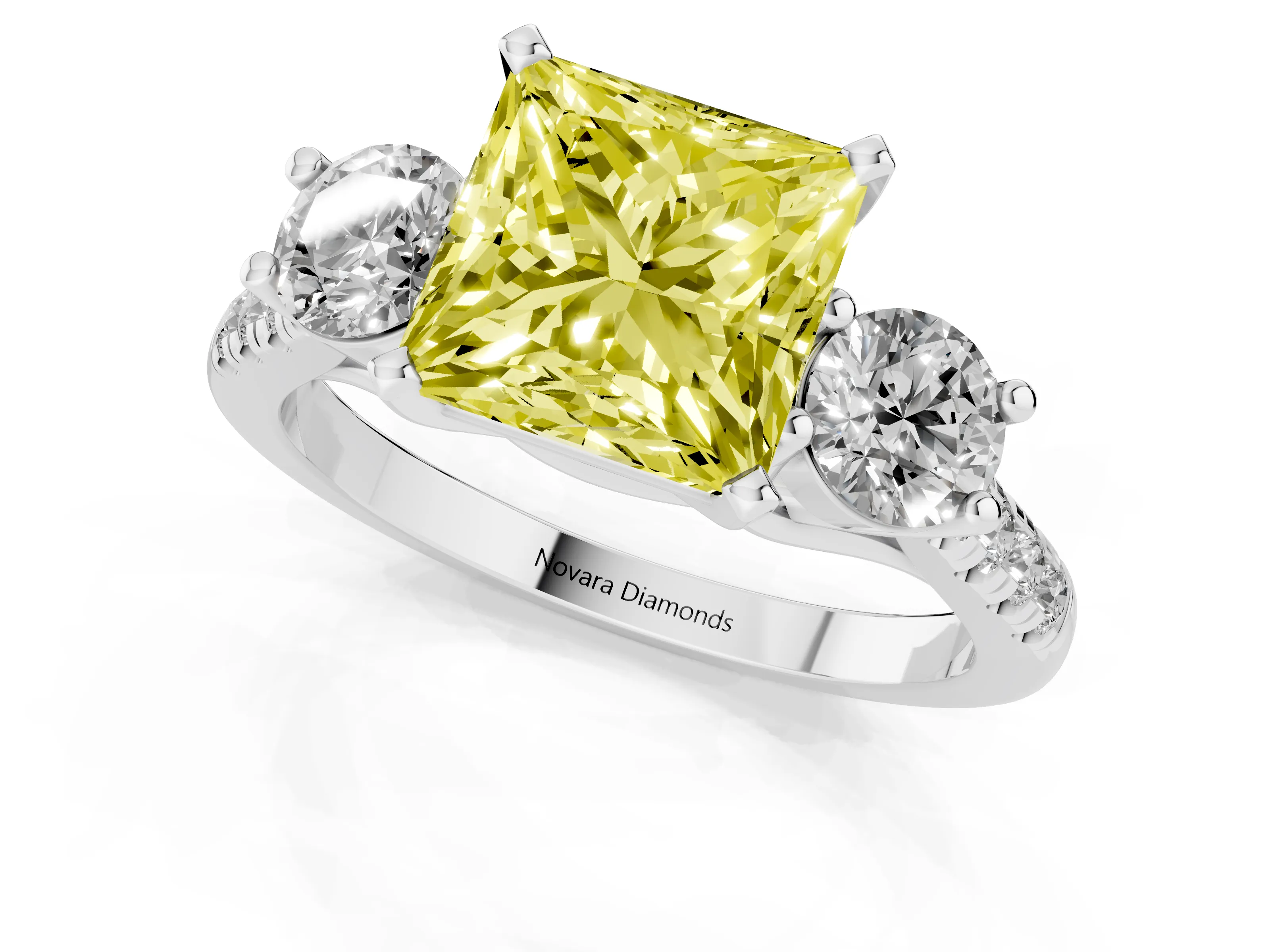 Fancy Yellow Three-Stone Princess Cut Diamond Pavé Band Ring Set in White gold with Prong-Set Trio